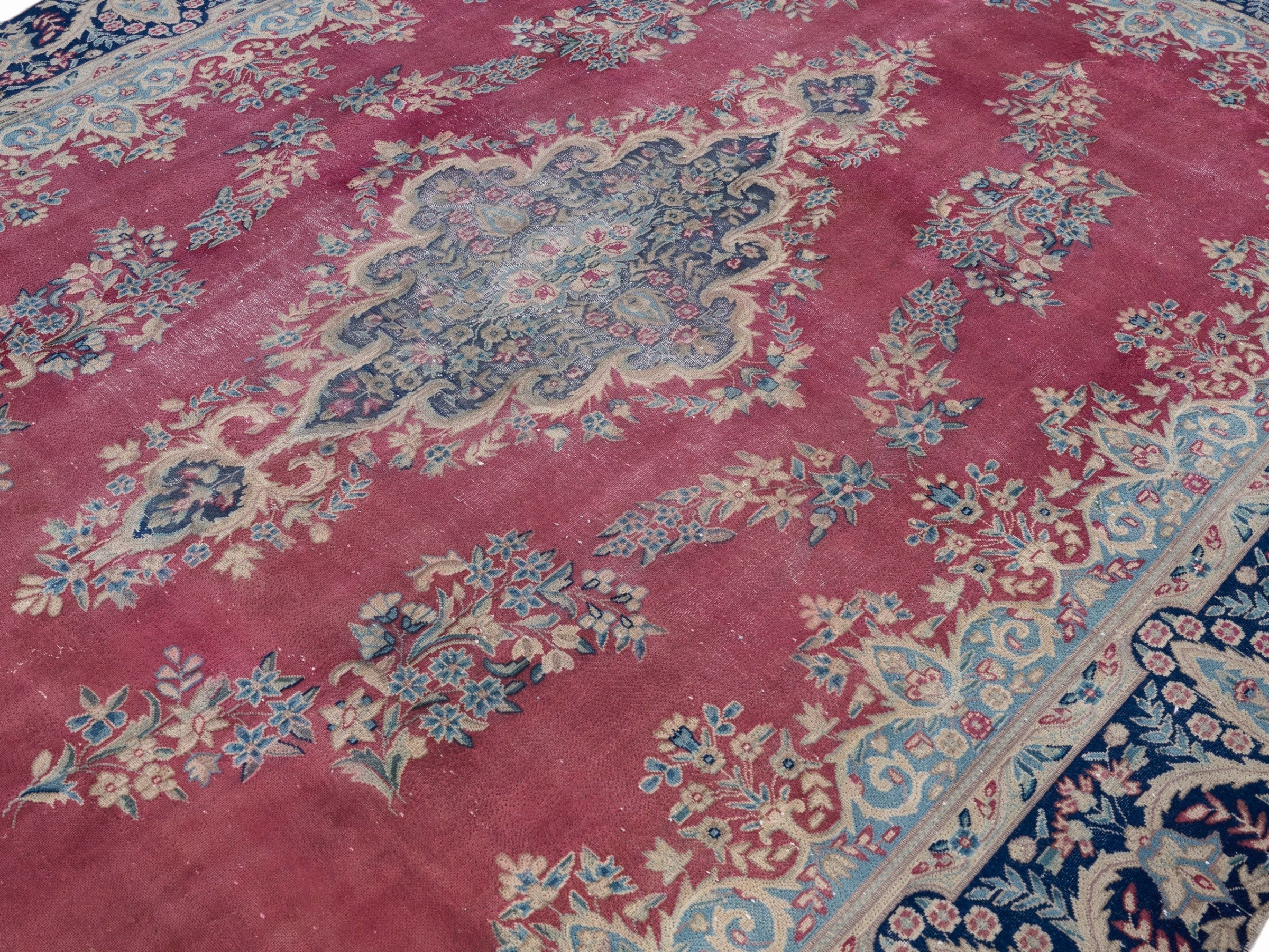Persian Kerman oversized rug in rose and navy, view 5 of 15