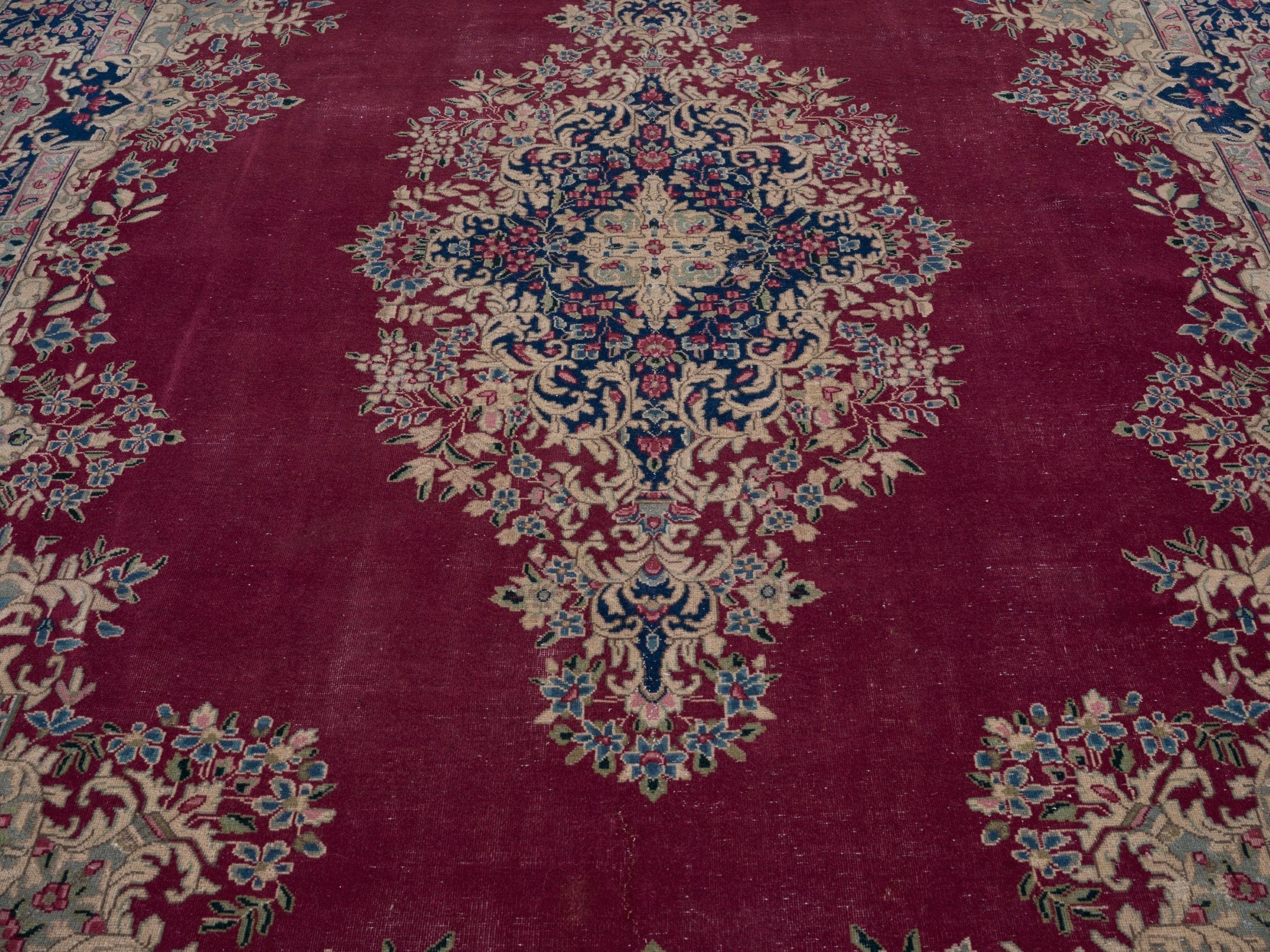 Persian Kerman oversized rug in deep red and navy, view 4 of 15