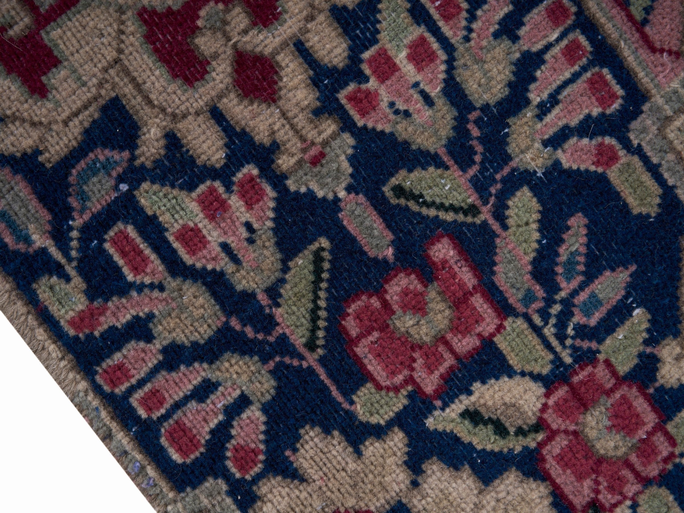 Persian Kerman oversized rug in deep red and navy, view 6 of 15