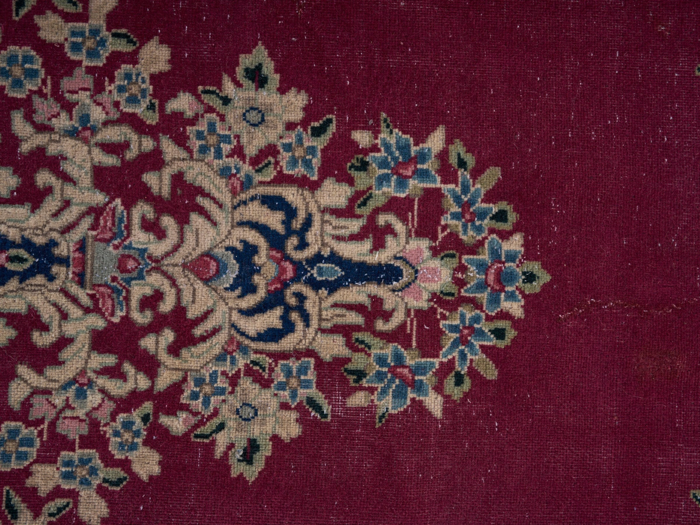 Persian Kerman oversized rug in deep red and navy, view 9 of 15
