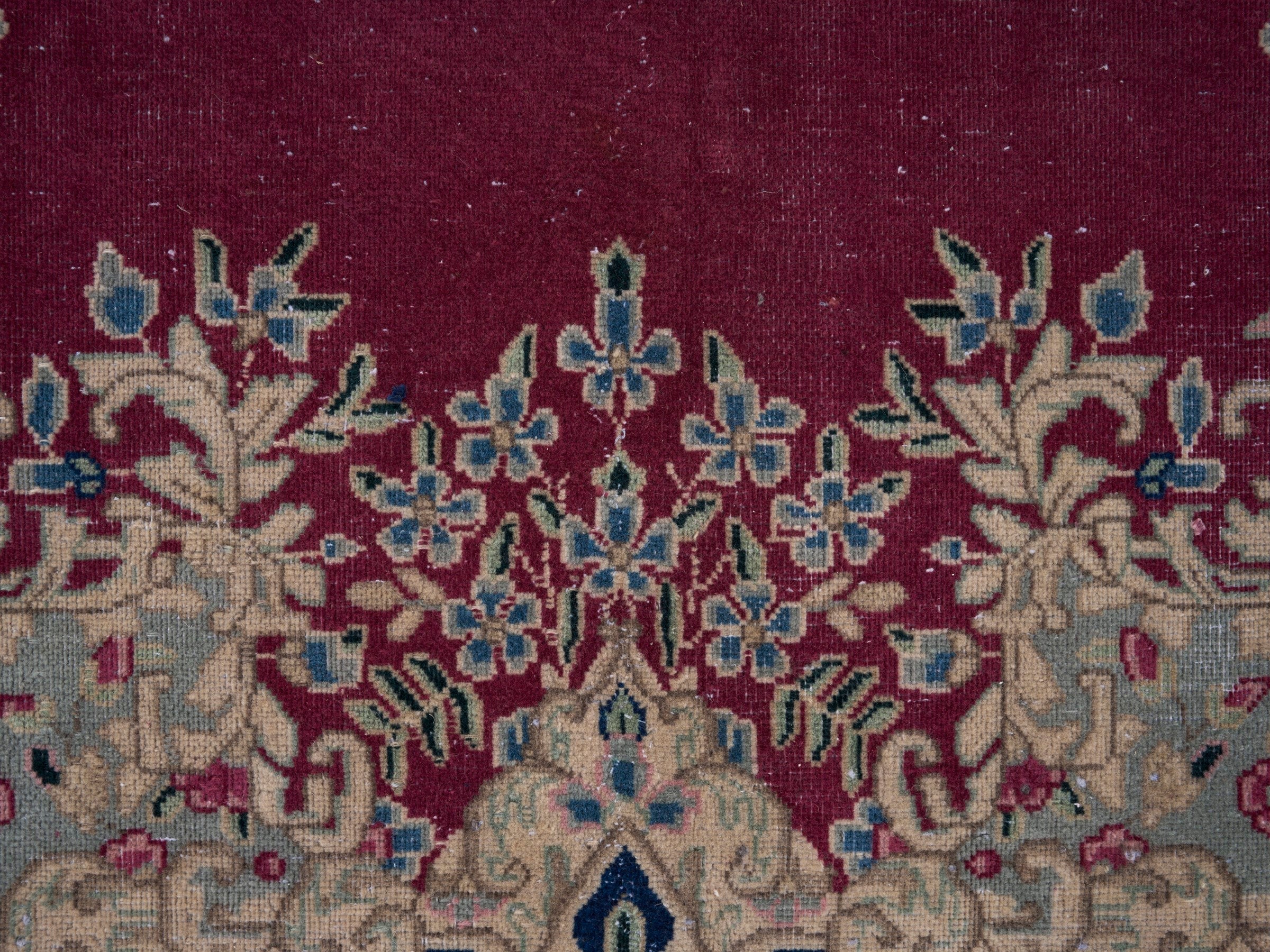 Persian Kerman oversized rug in deep red and navy, view 11 of 15