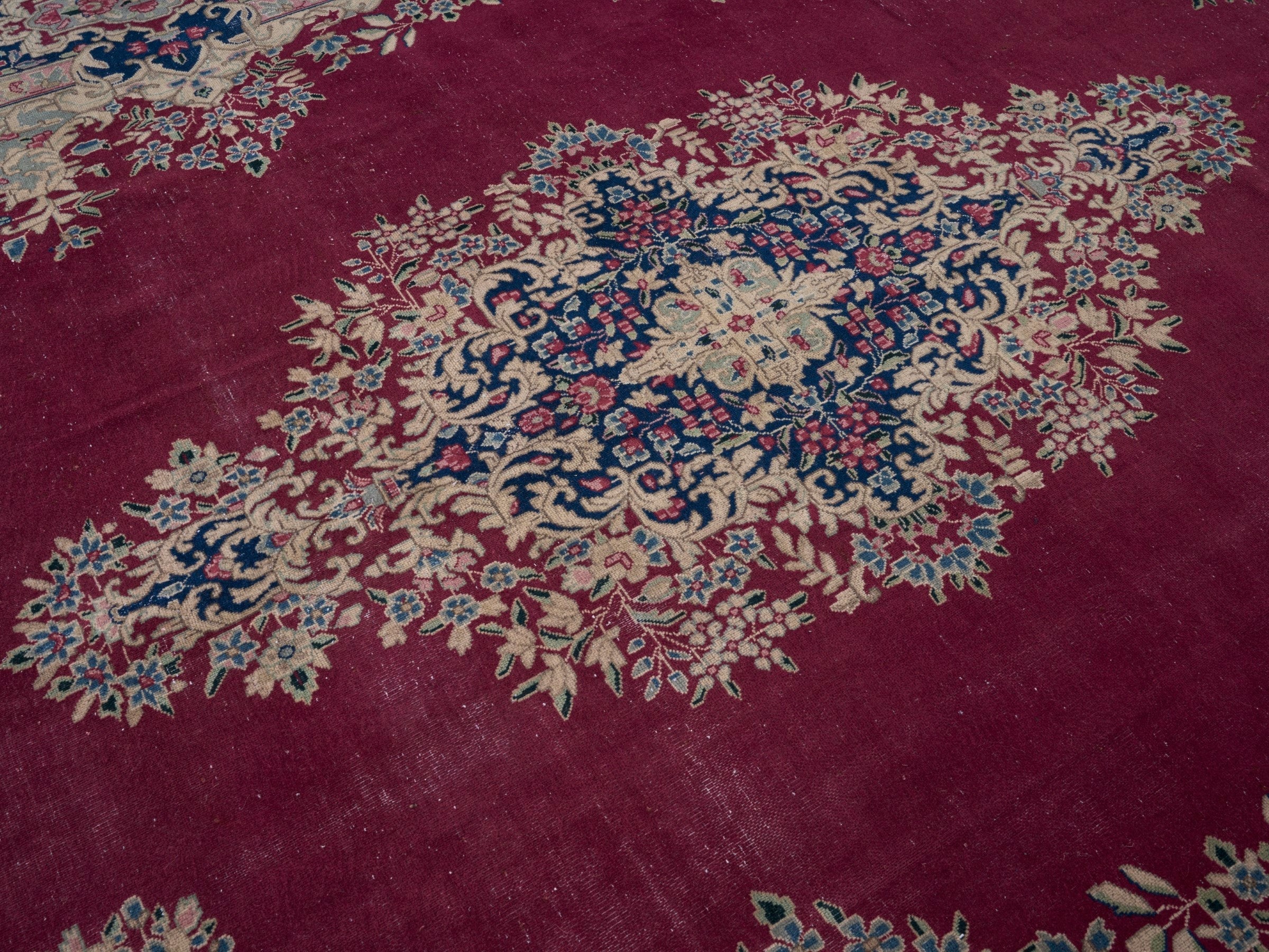 Persian Kerman oversized rug in deep red and navy, view 12 of 15