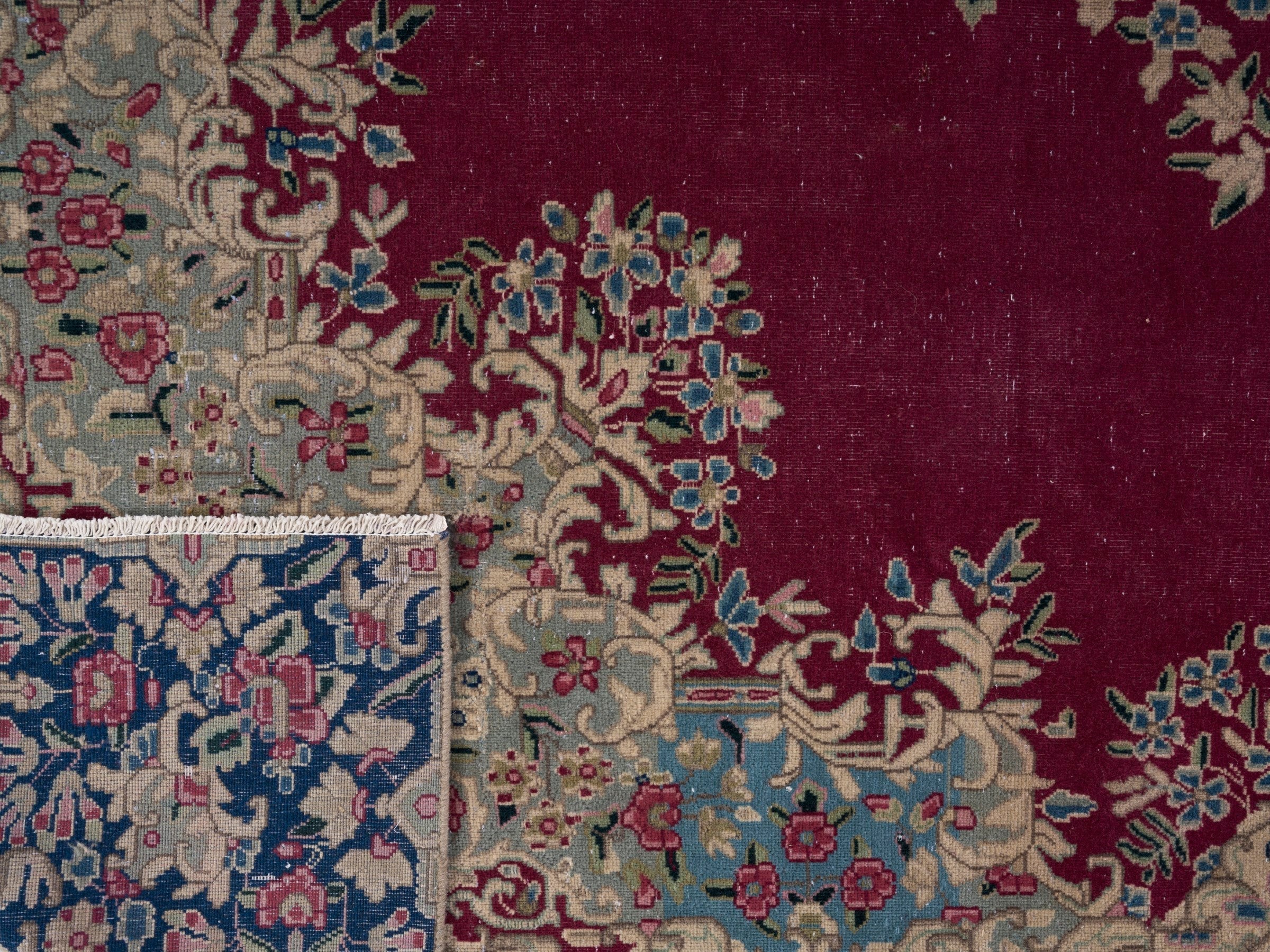 Persian Kerman oversized rug in deep red and navy, view 15 of 15