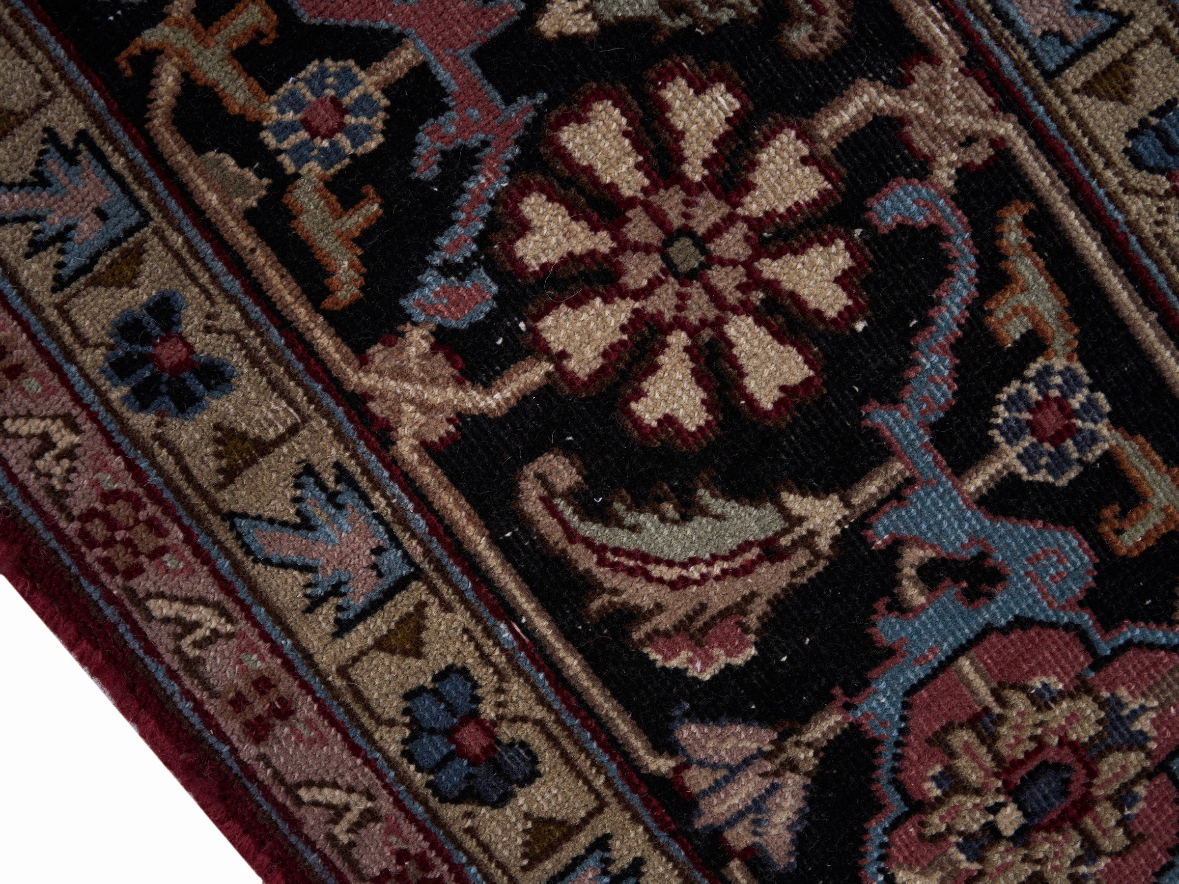 Persian Heriz oversized rug in burgundy and dark brown, view 6 of 15