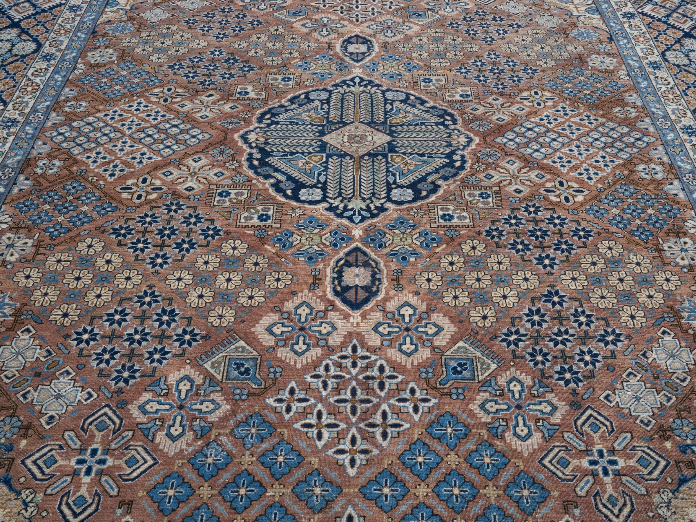 Persian Kashan oversized rug in rust and navy, view 4 of 15