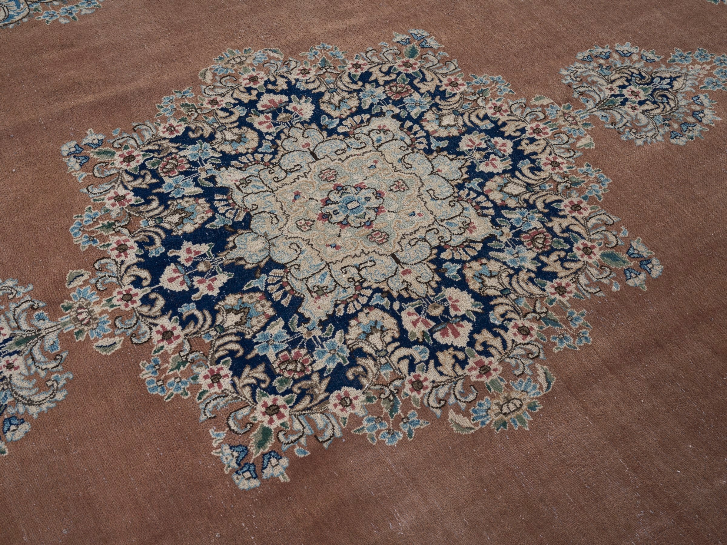 Persian Kerman oversized rug in terracotta and navy, view 12 of 15