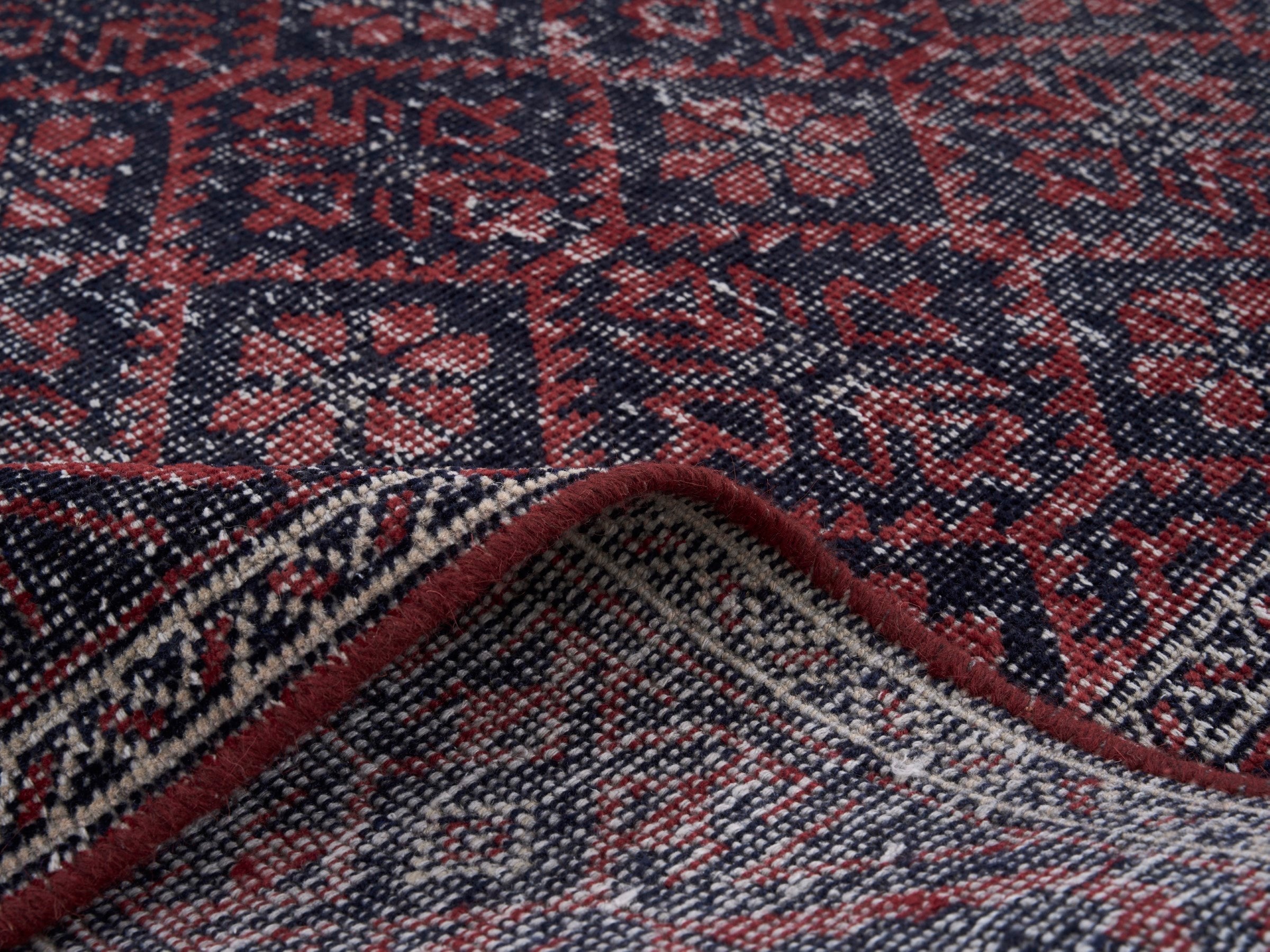 Persian Baluch area rug in burgundy and faded red, view 9 of 10