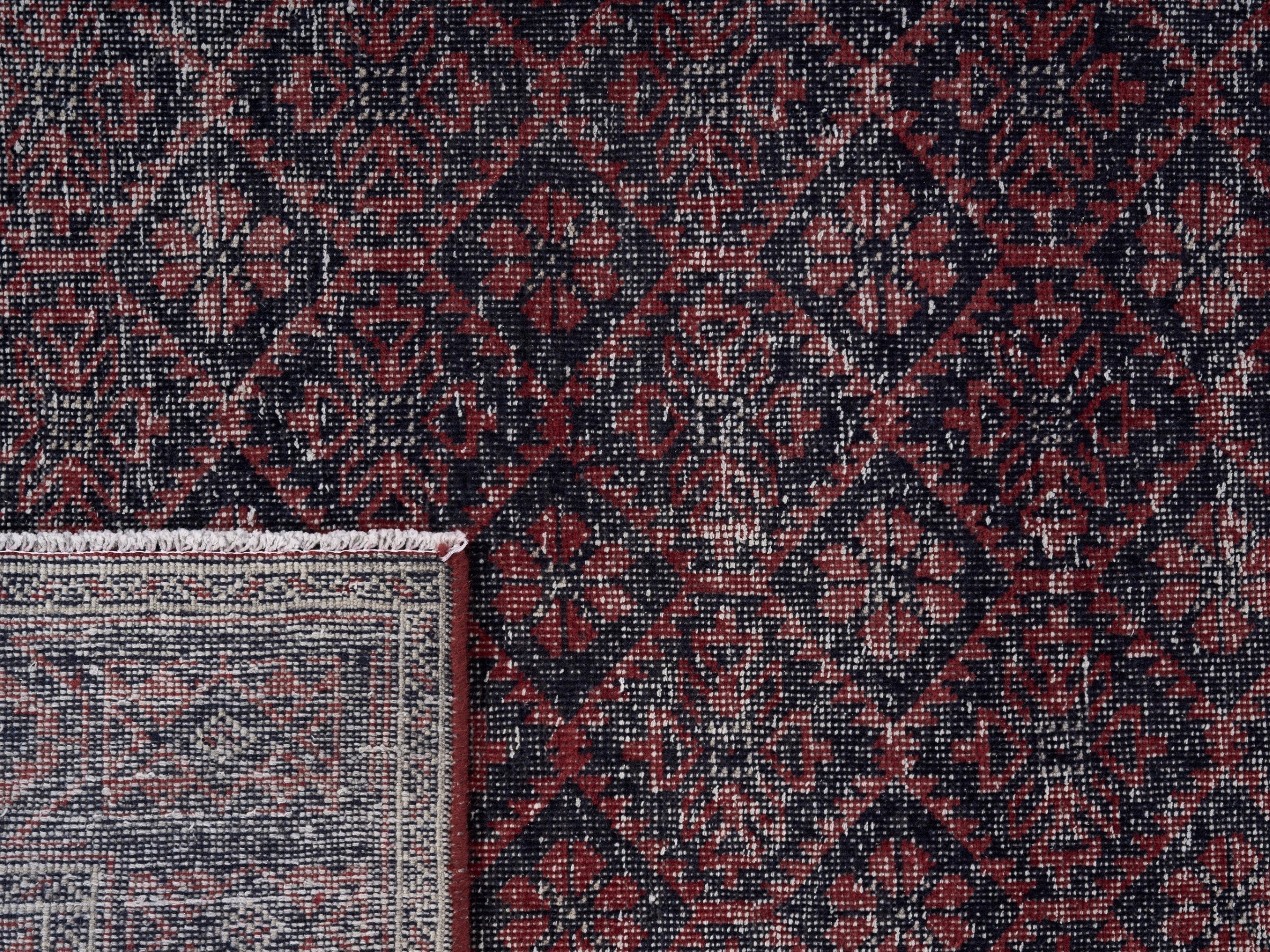 Persian Baluch area rug in burgundy and faded red, view 10 of 10
