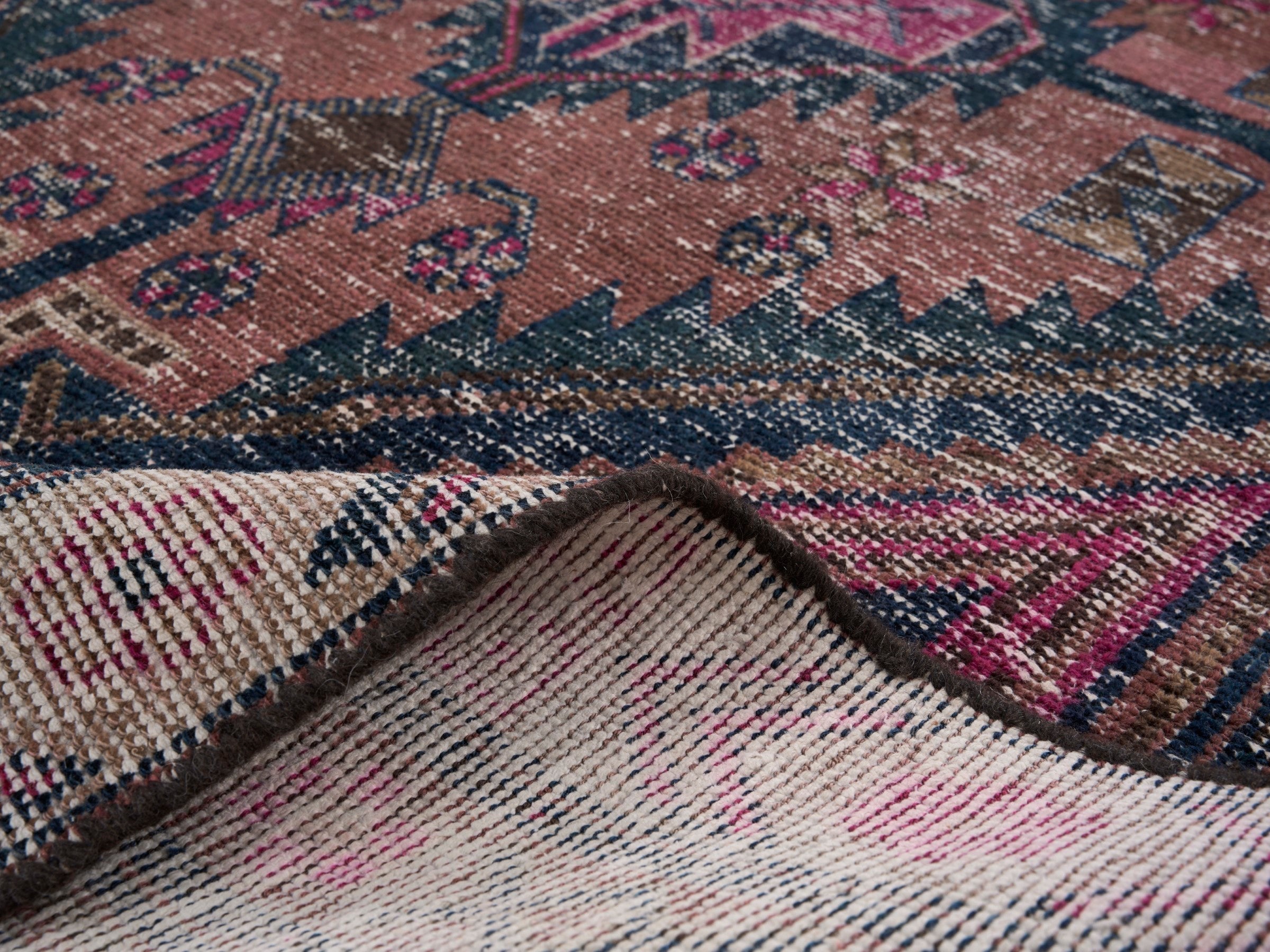 Persian Lori area rug in dusty rose and deep indigo, view 9 of 10
