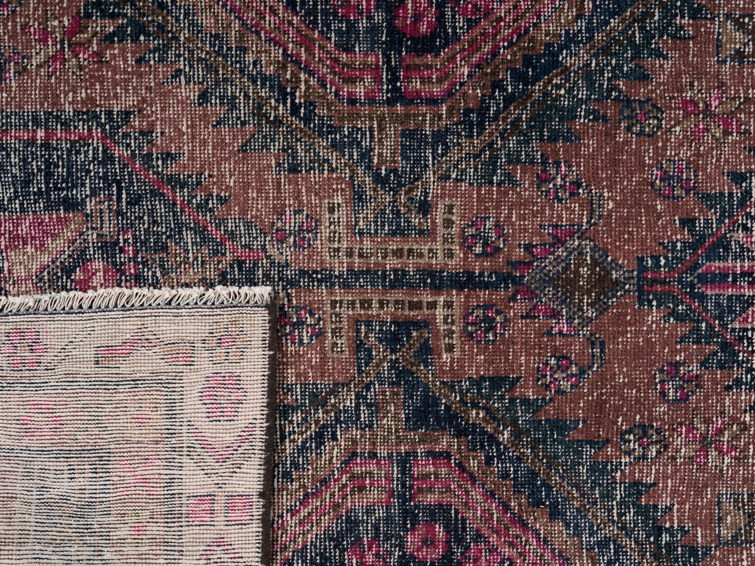 Persian Lori area rug in dusty rose and deep indigo, view 10 of 10
