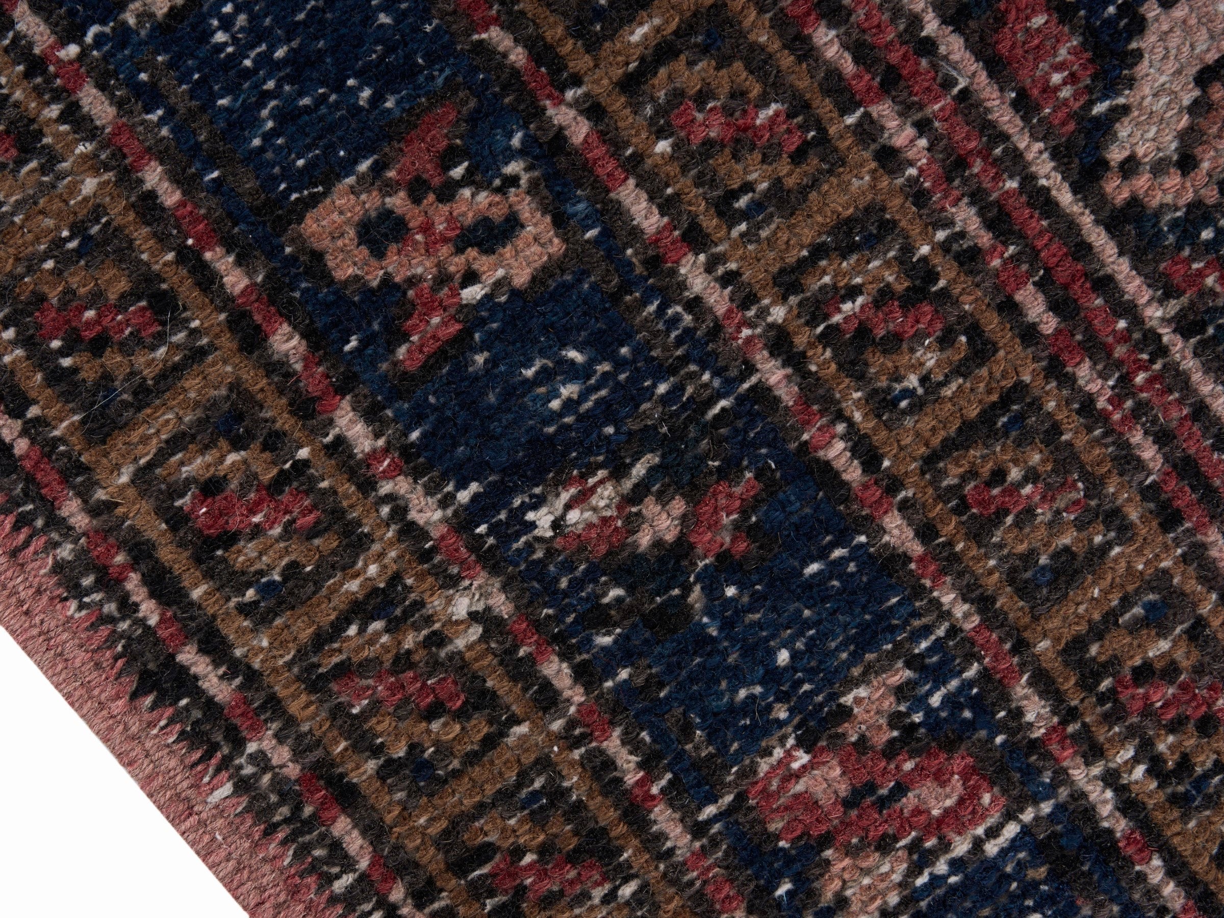 Persian Gharajeh runner rug in faded red and navy, view 6 of 10