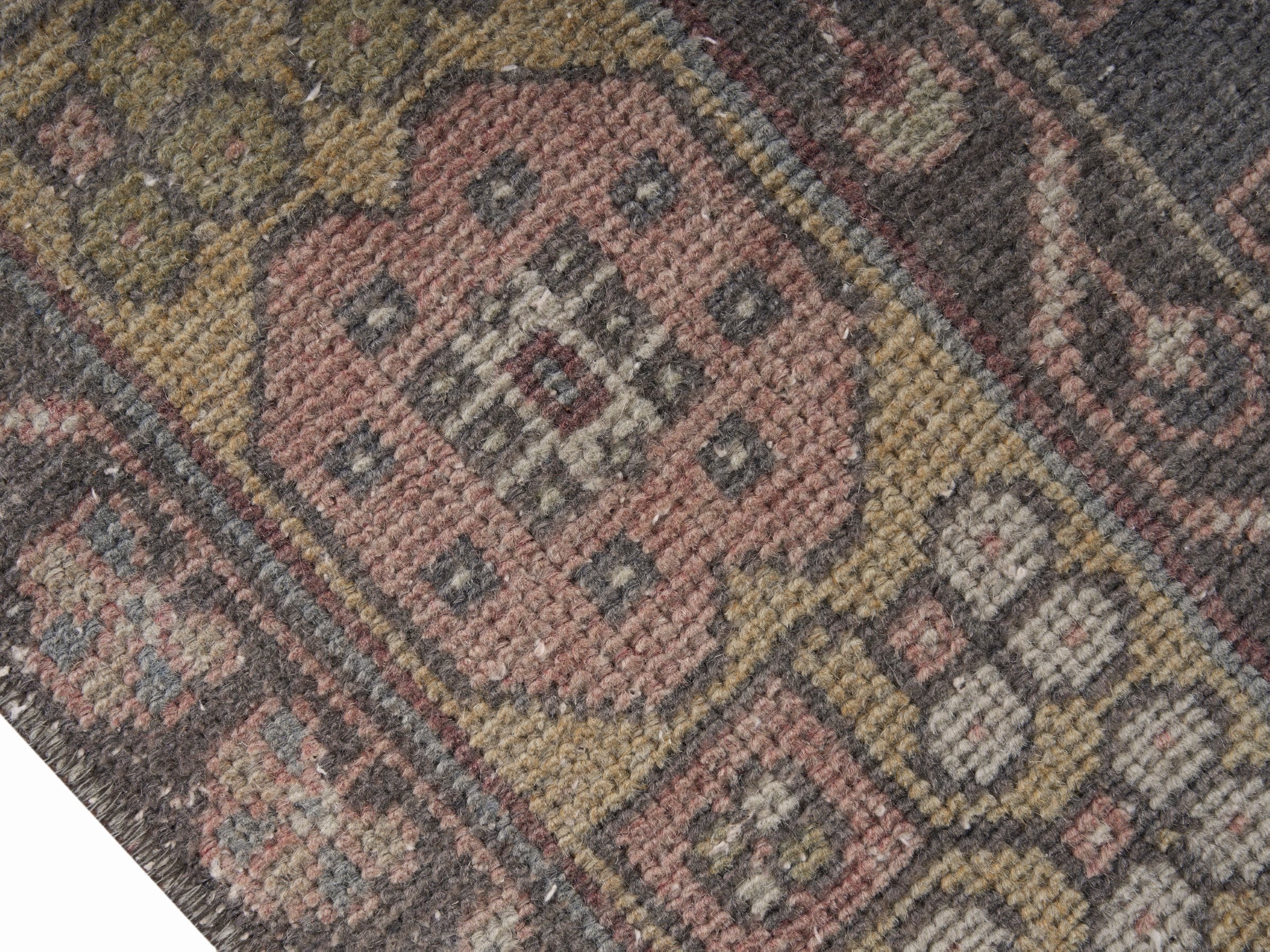 Turkish Anatolian area rug in muted pink and slate, view 6 of 10