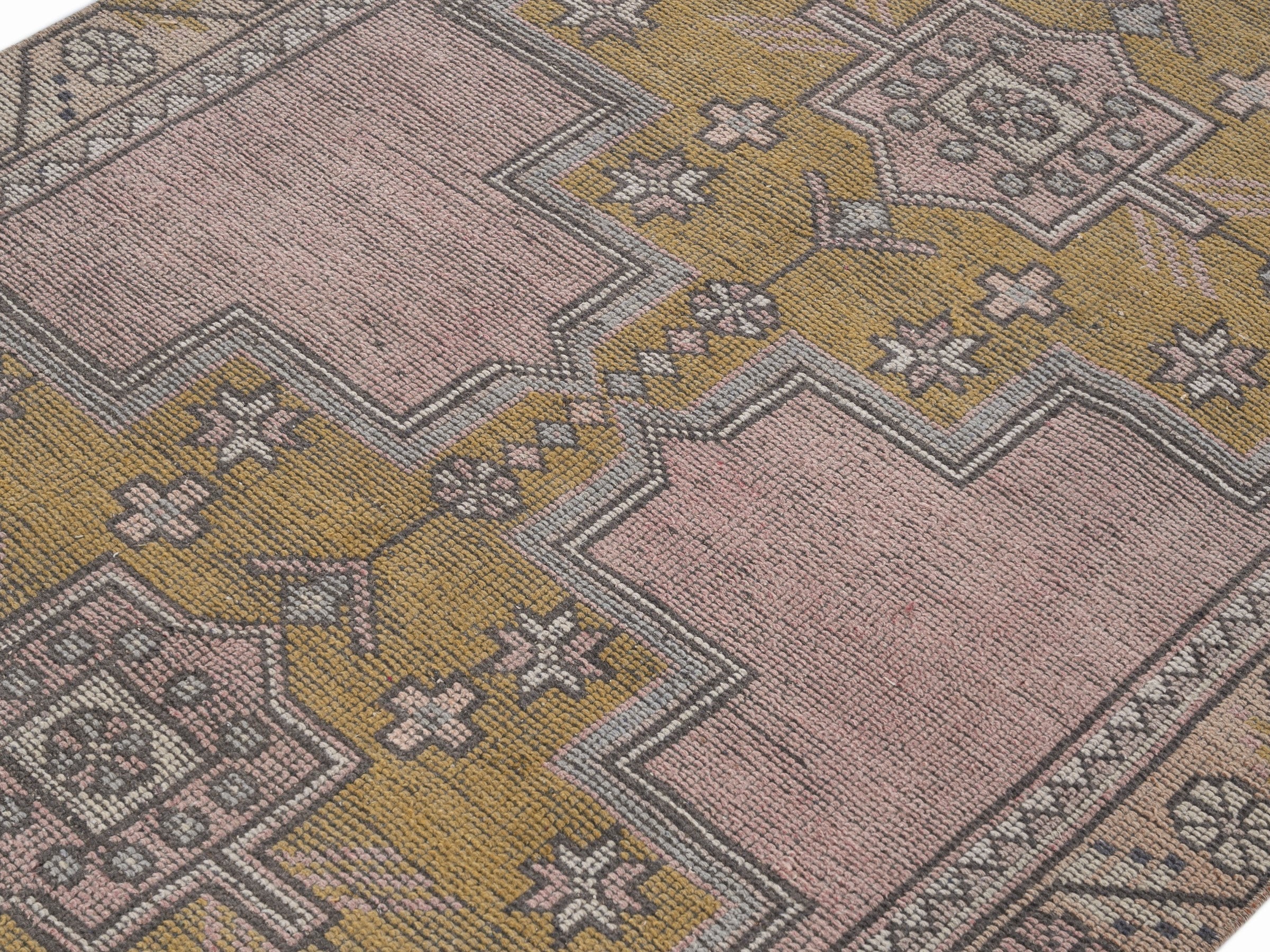 Turkish Anatolian runner rug in muted pink and muted yellow, view 5 of 10