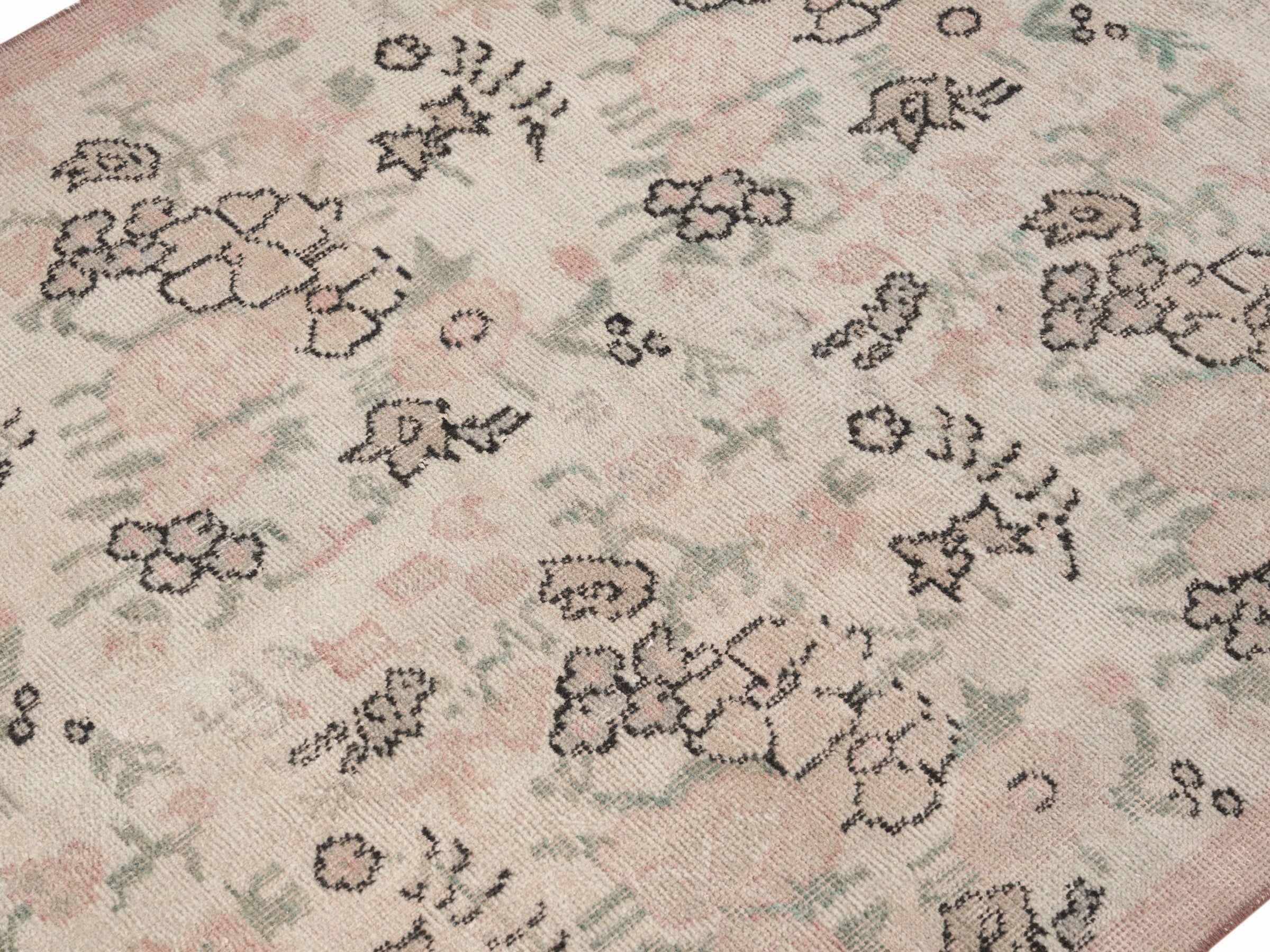 Turkish Isparta accent rug in cream and muted pink, view 5 of 10