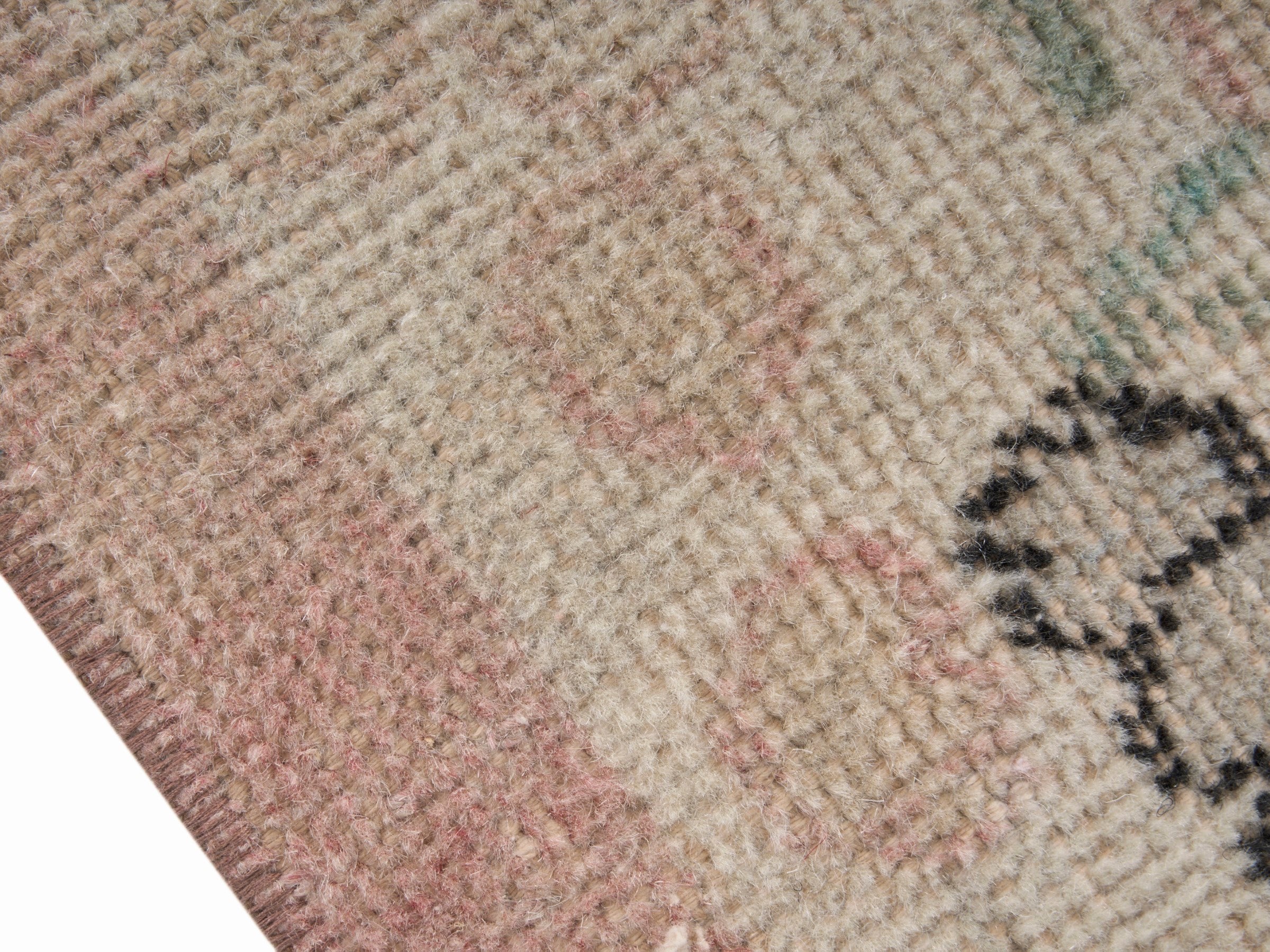 Turkish Isparta accent rug in cream and muted pink, view 6 of 10