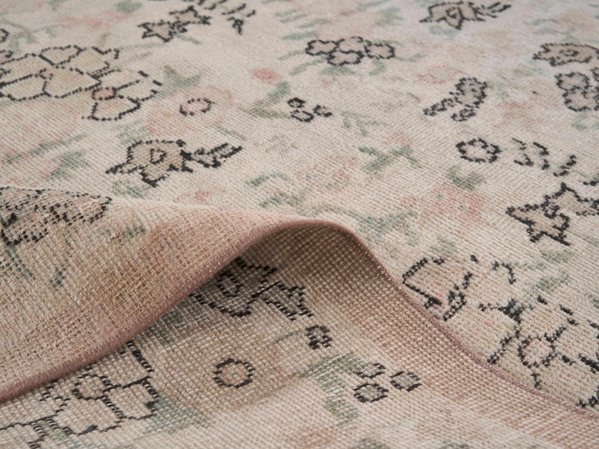 Turkish Isparta accent rug in cream and muted pink, view 9 of 10