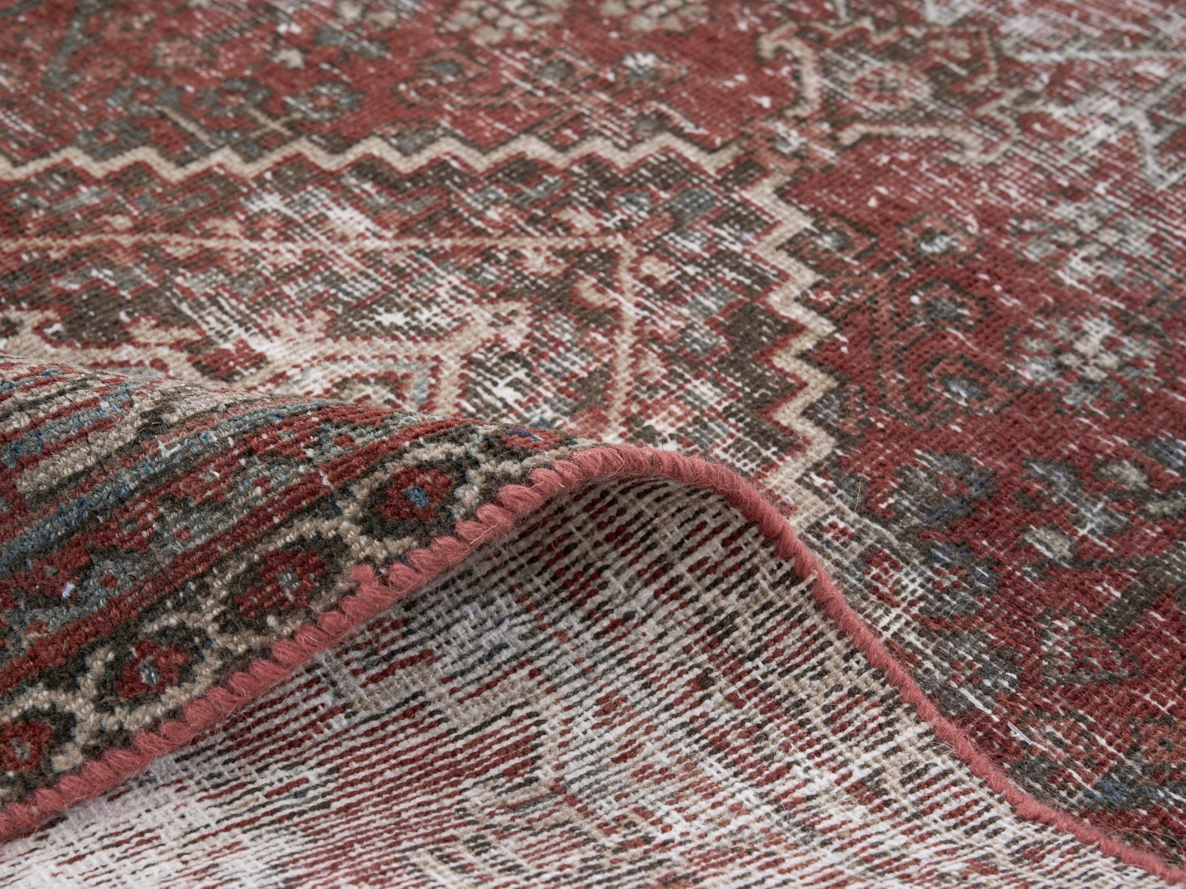 Persian Joshaghan accent rug in faded red and cream, view 9 of 10