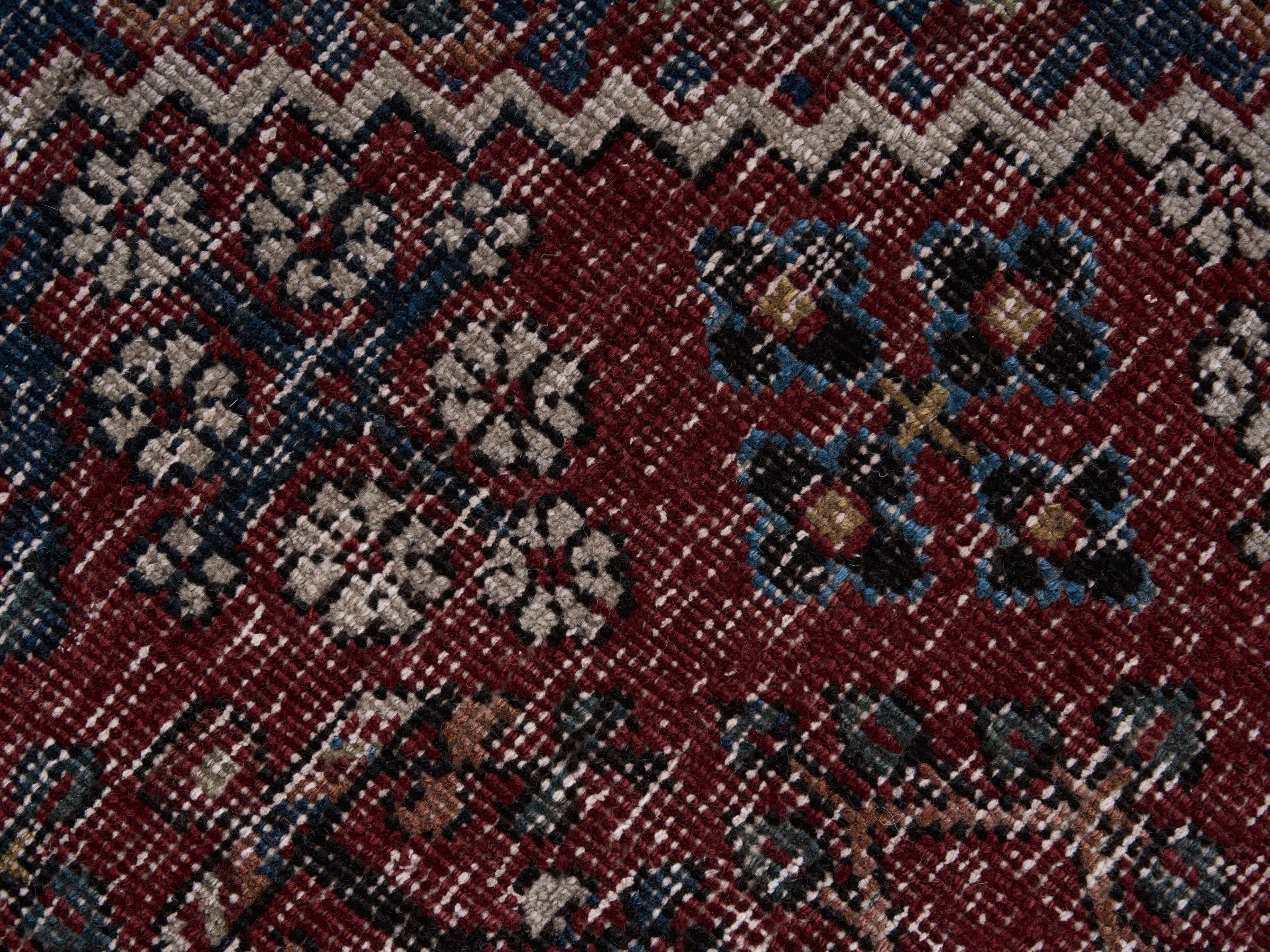 Persian Joshaghan area rug in faded red and charcoal, view 7 of 10