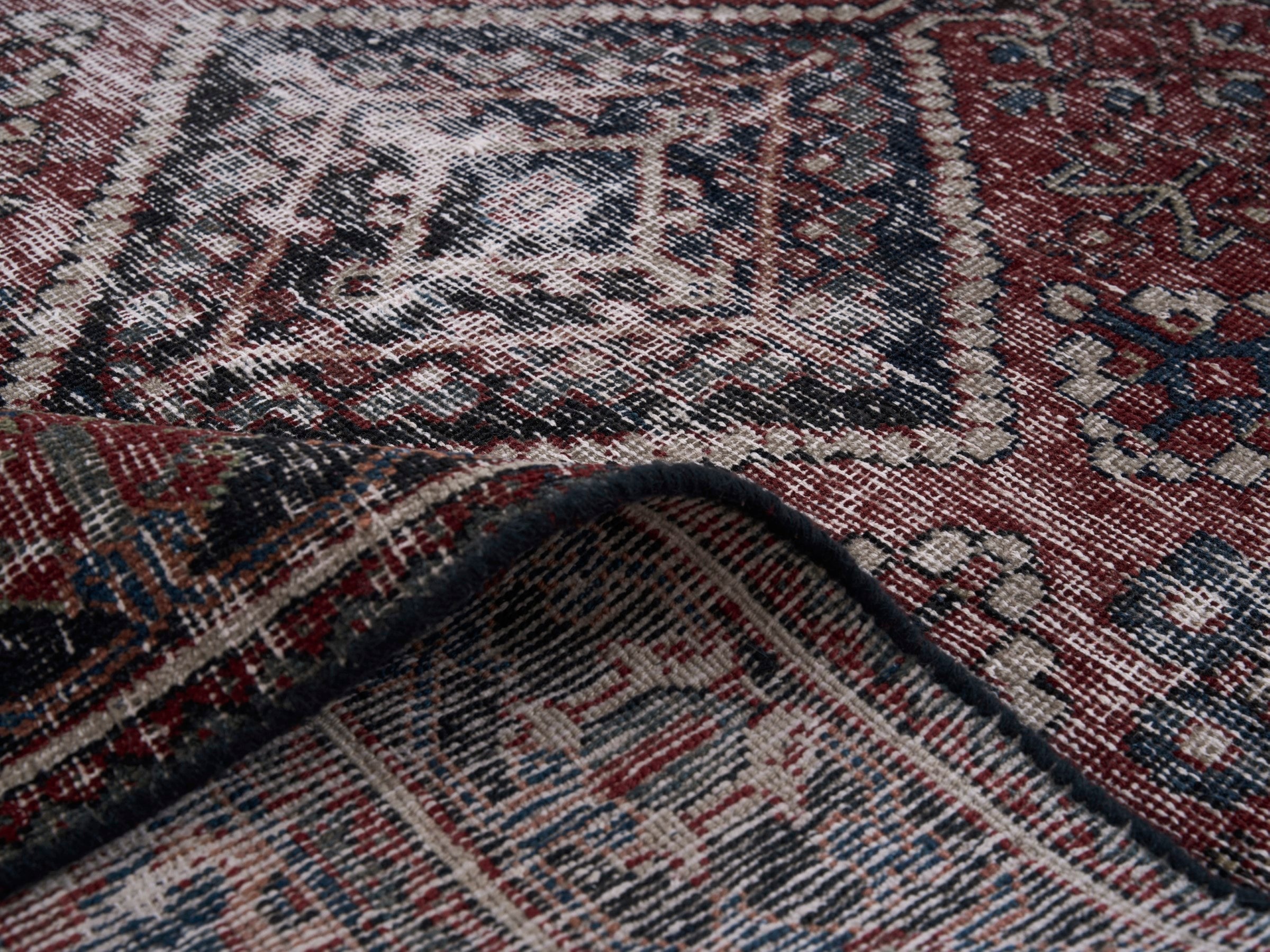 Persian Joshaghan area rug in faded red and charcoal, view 9 of 10