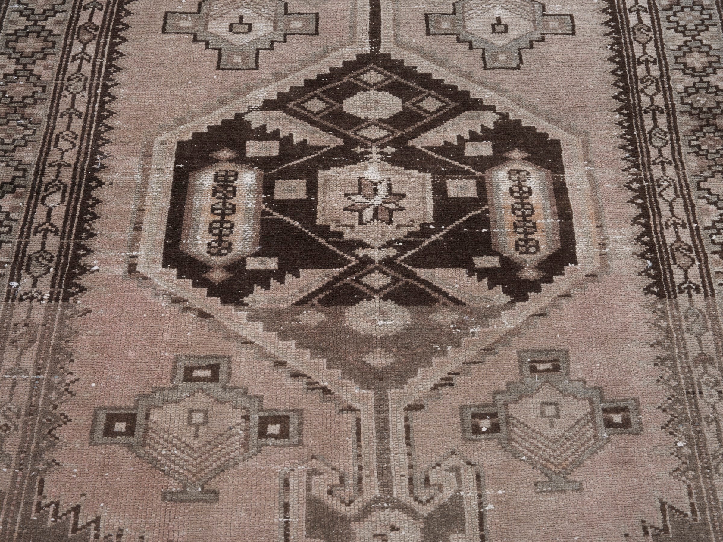 Persian Zanjan accent rug in muted pink and dark brown, view 4 of 10