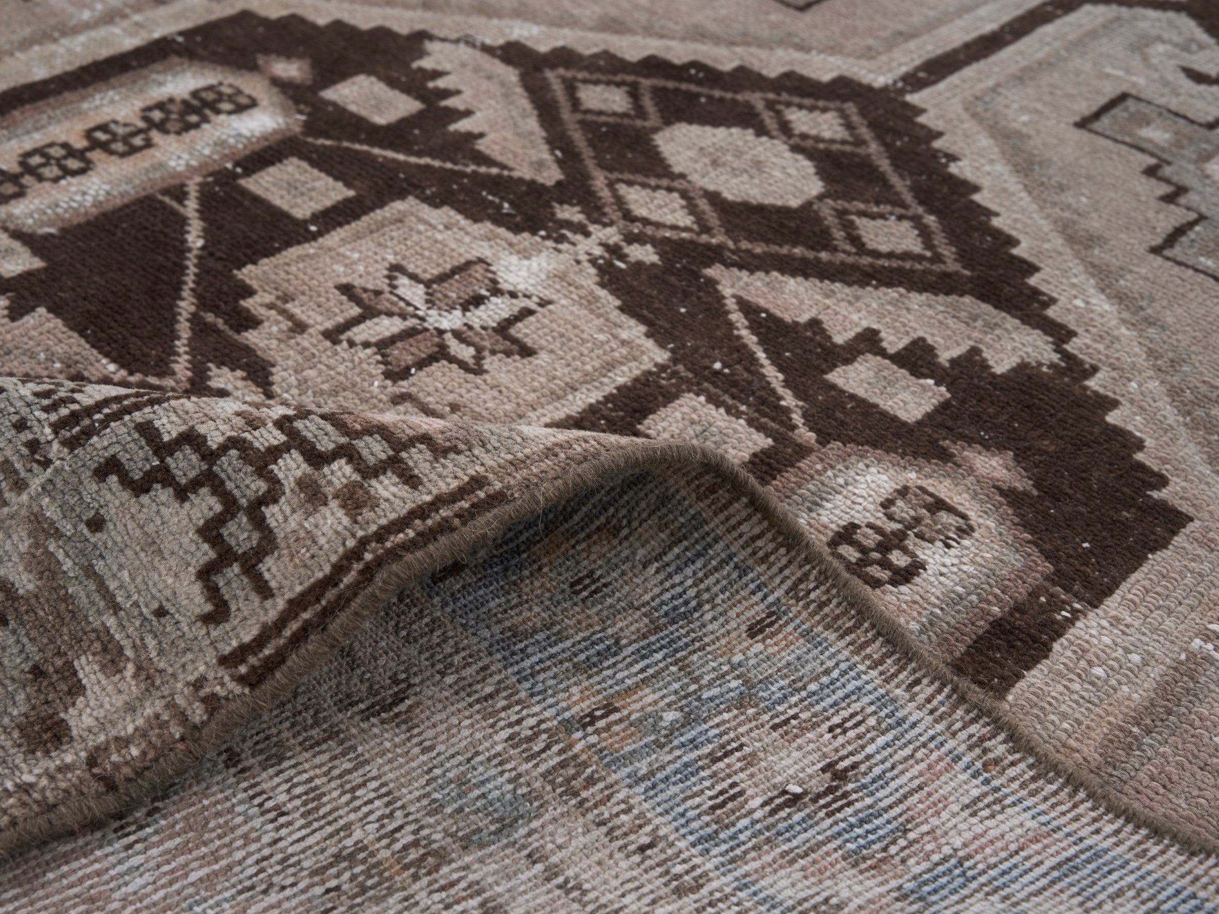 Persian Zanjan accent rug in muted pink and dark brown, view 9 of 10