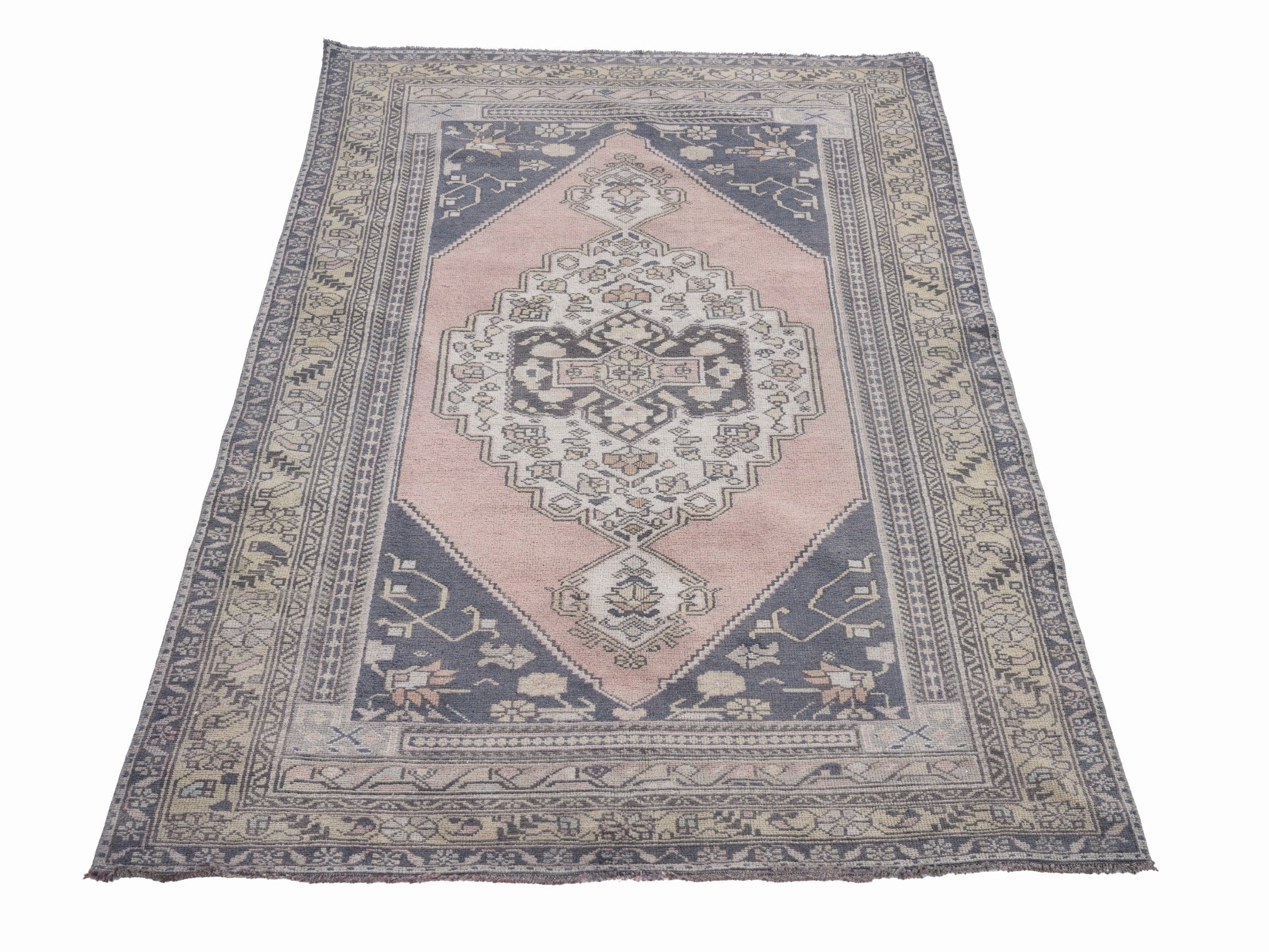 Turkish Anatolian area rug in navy and muted pink, view 2 of 10