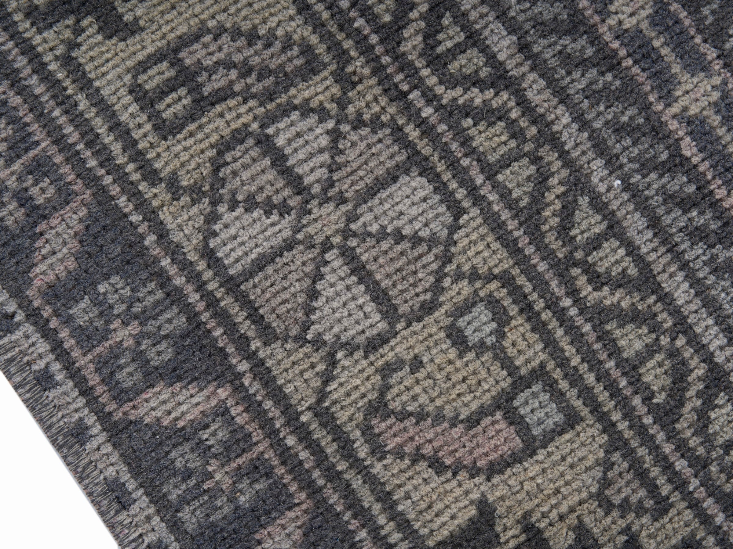 Turkish Anatolian area rug in navy and muted pink, view 6 of 10