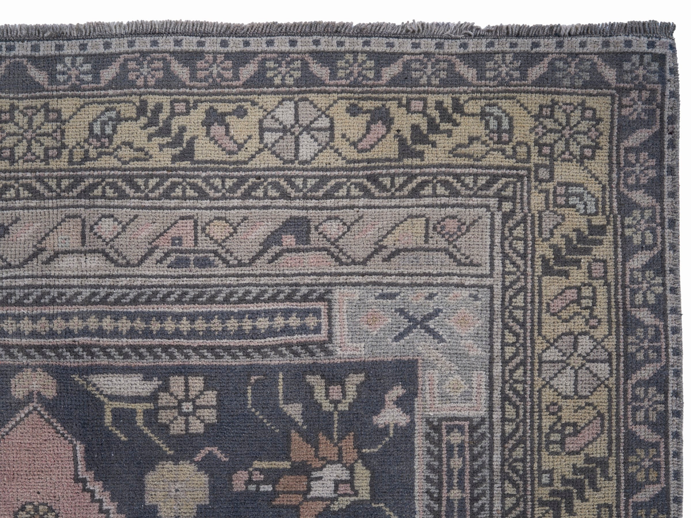 Turkish Anatolian area rug in navy and muted pink, view 8 of 10