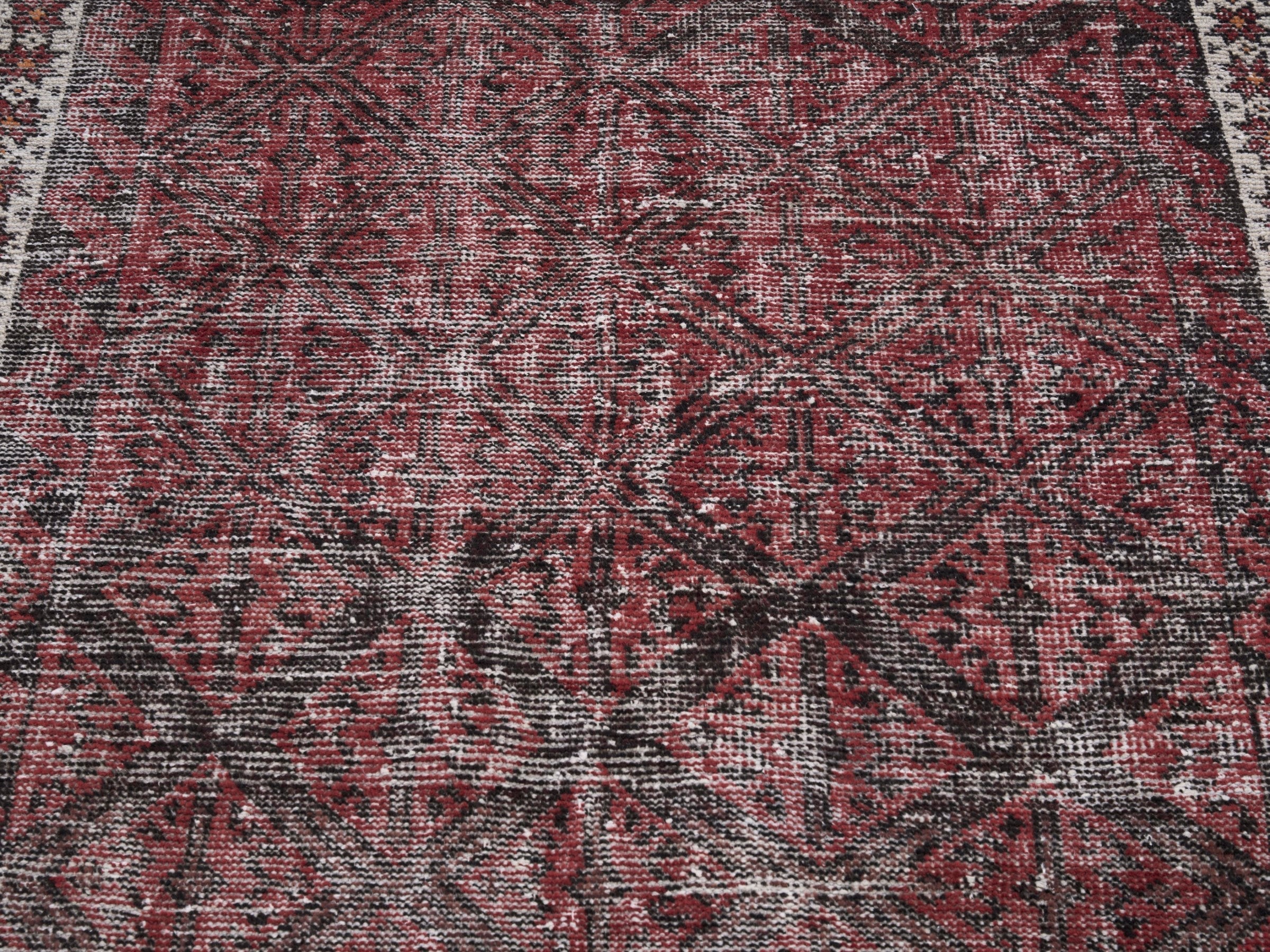 Persian Baluch accent rug in burgundy and faded red, view 4 of 10