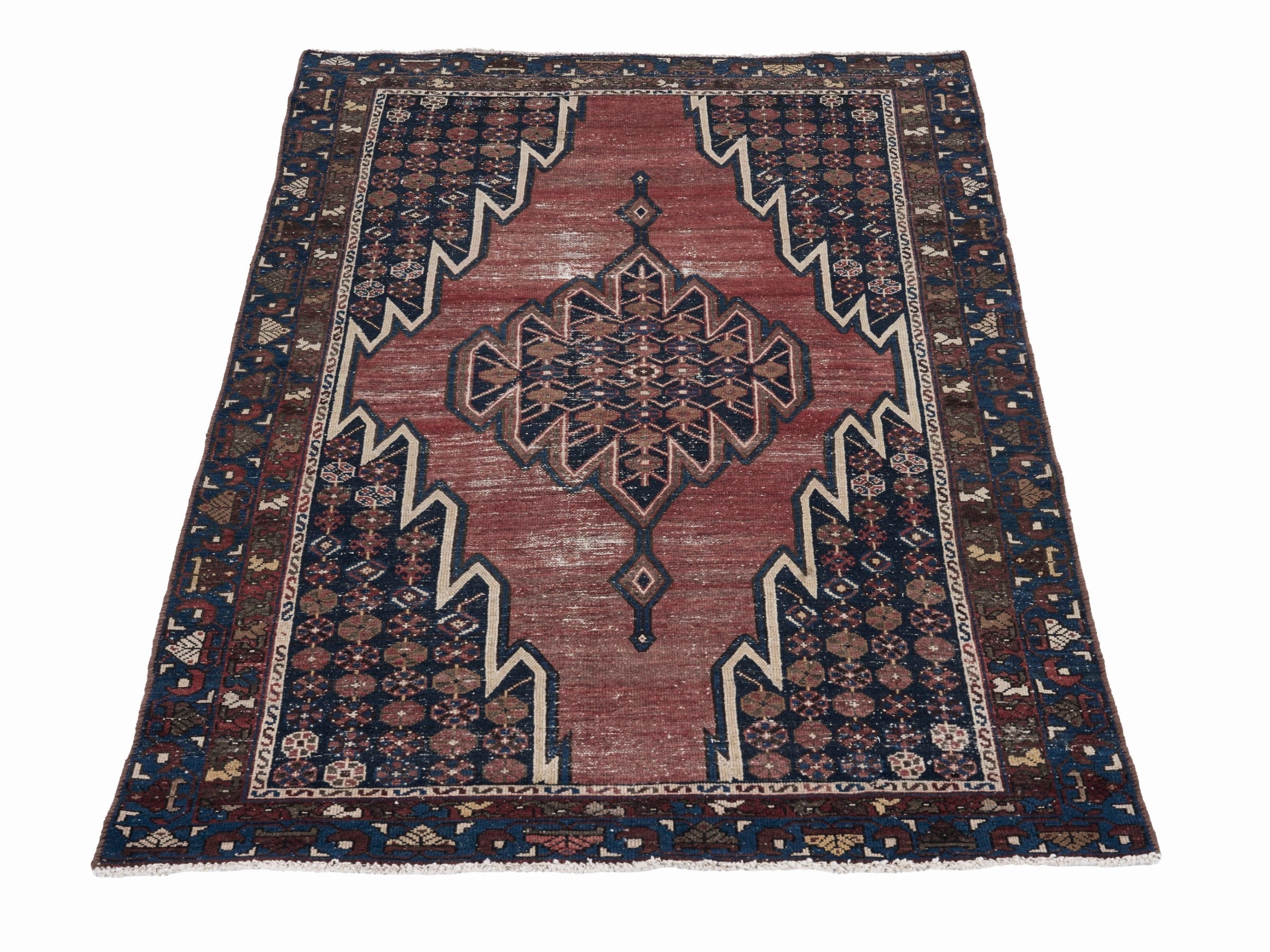 Persian Saveh accent rug in rust and navy, view 2 of 10