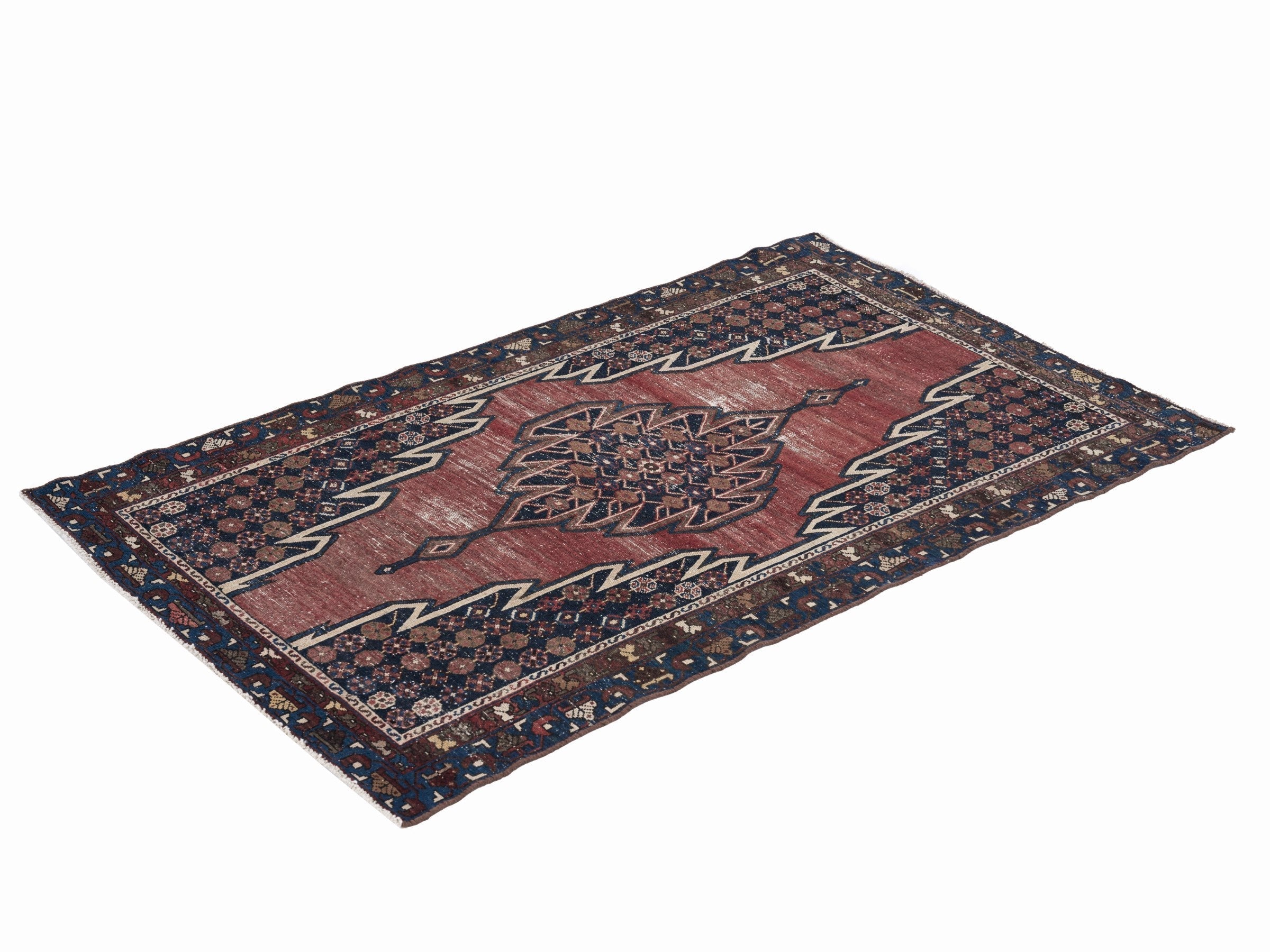 Persian Saveh accent rug in rust and navy, view 3 of 10