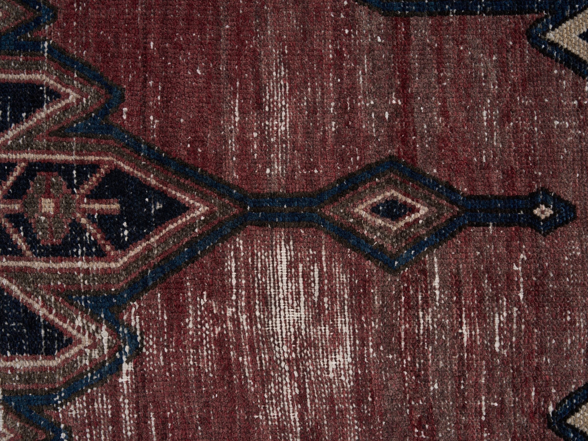 Persian Saveh accent rug in rust and navy, view 7 of 10