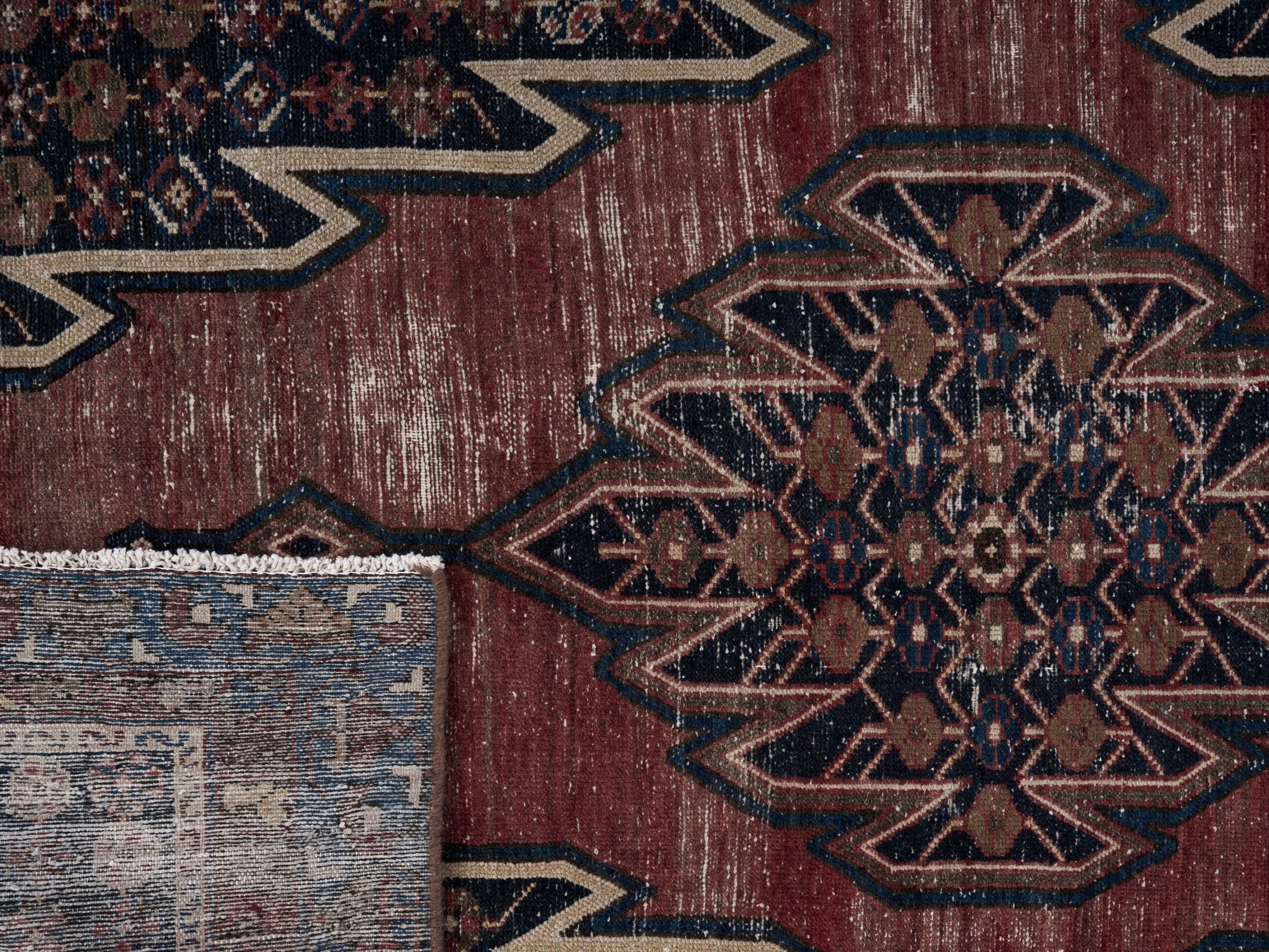 Persian Saveh accent rug in rust and navy, view 10 of 10