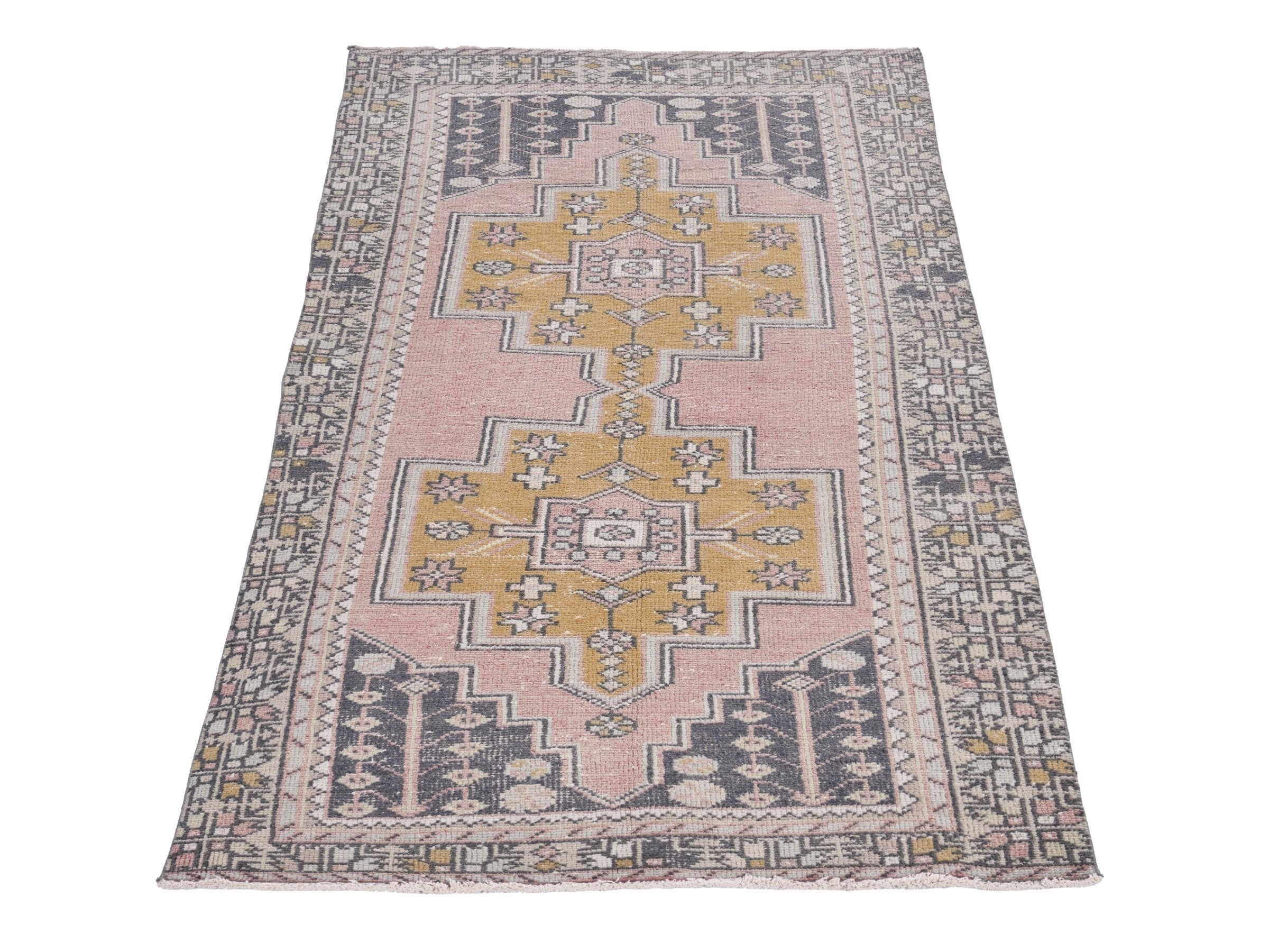 Turkish Anatolian runner rug in muted pink and mustard, view 2 of 10