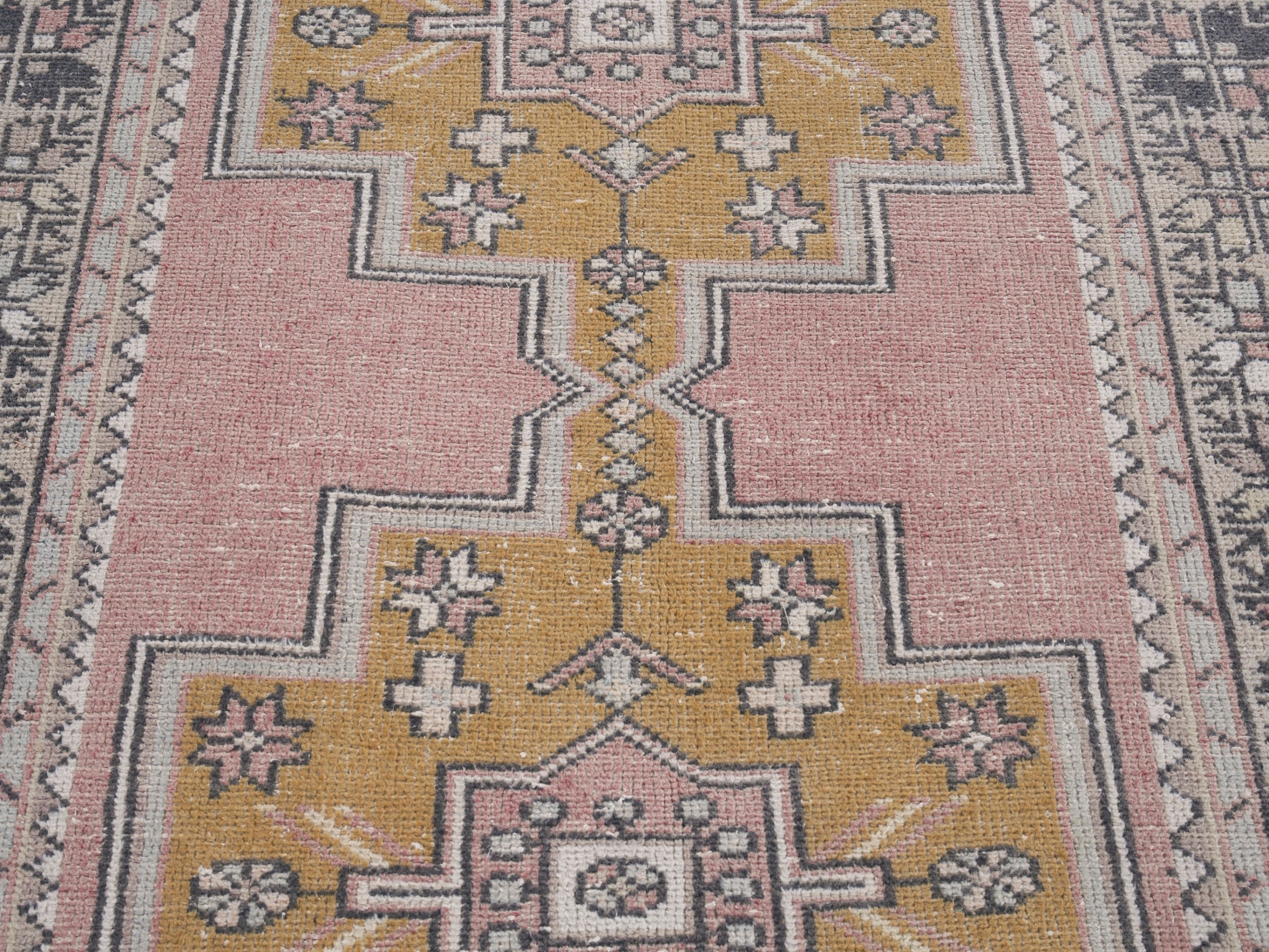 Turkish Anatolian runner rug in muted pink and mustard, view 4 of 10