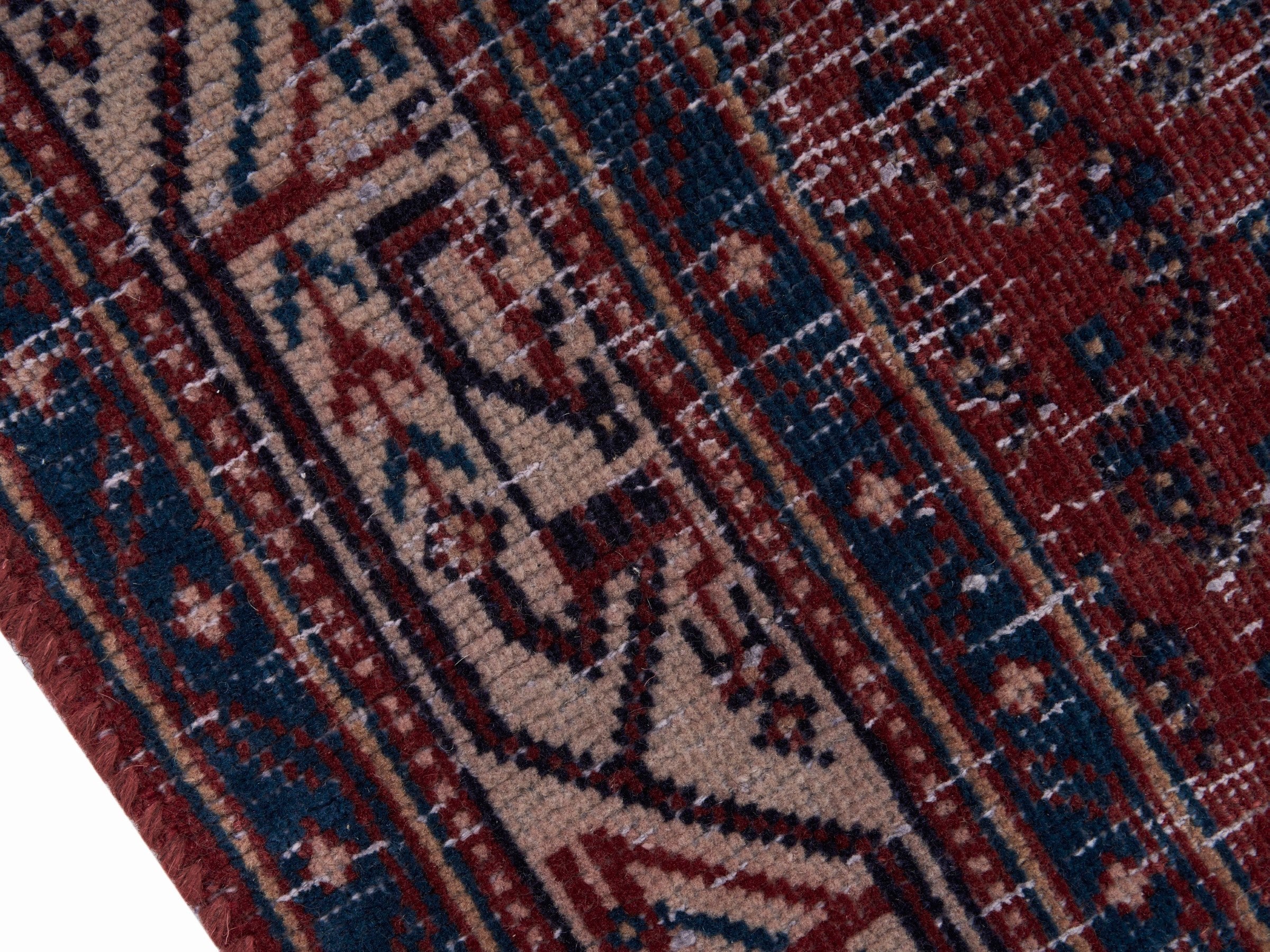 Persian Arak runner rug in burgundy and faded red, view 6 of 10