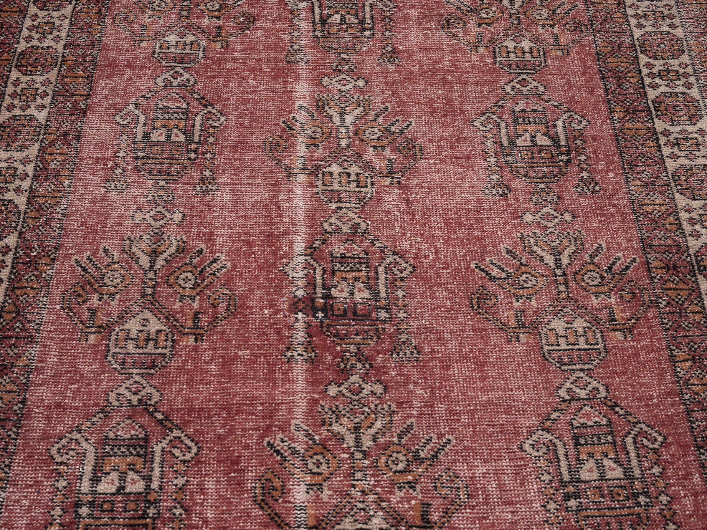 Persian Ferdos area rug in faded red and cream, view 4 of 10
