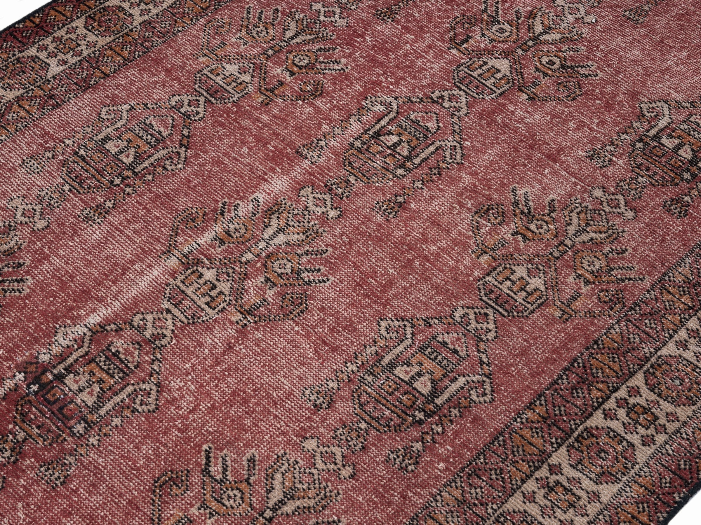 Persian Ferdos area rug in faded red and cream, view 5 of 10