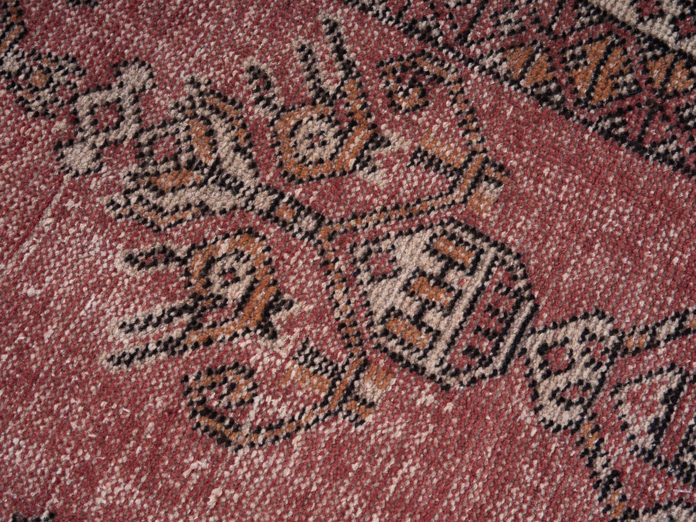 Persian Ferdos area rug in faded red and cream, view 7 of 10