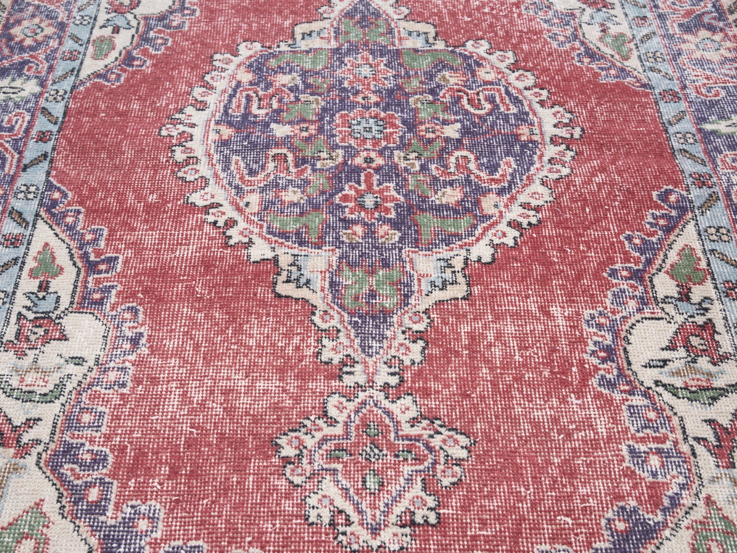 Turkish Isparta area rug in rose and navy, view 4 of 10