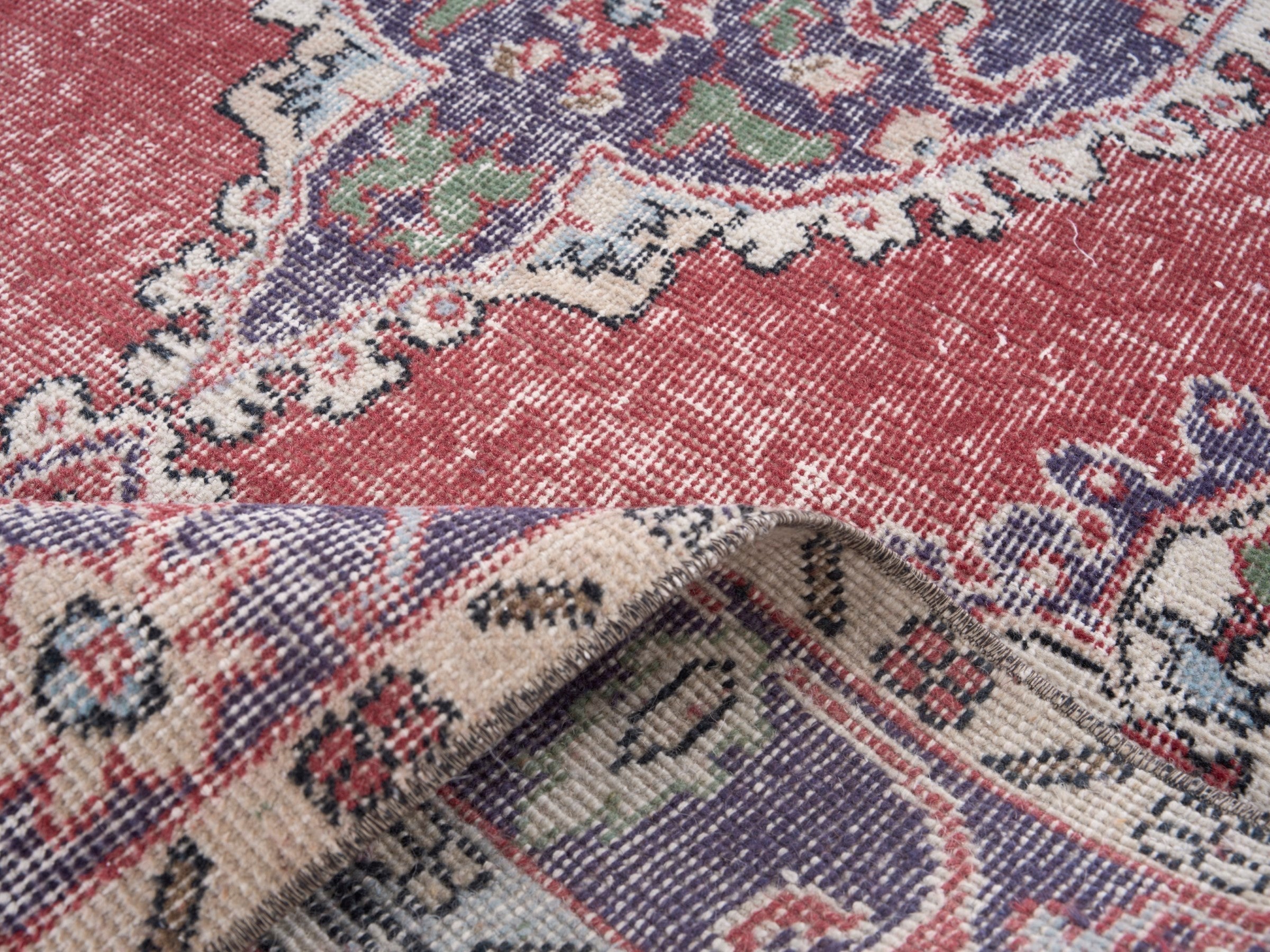Turkish Isparta area rug in rose and navy, view 9 of 10