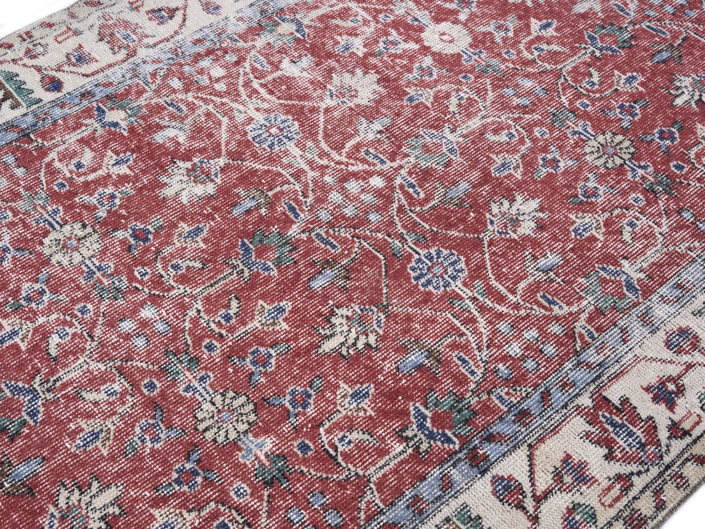 Turkish Isparta area rug in faded red and cream, view 5 of 10