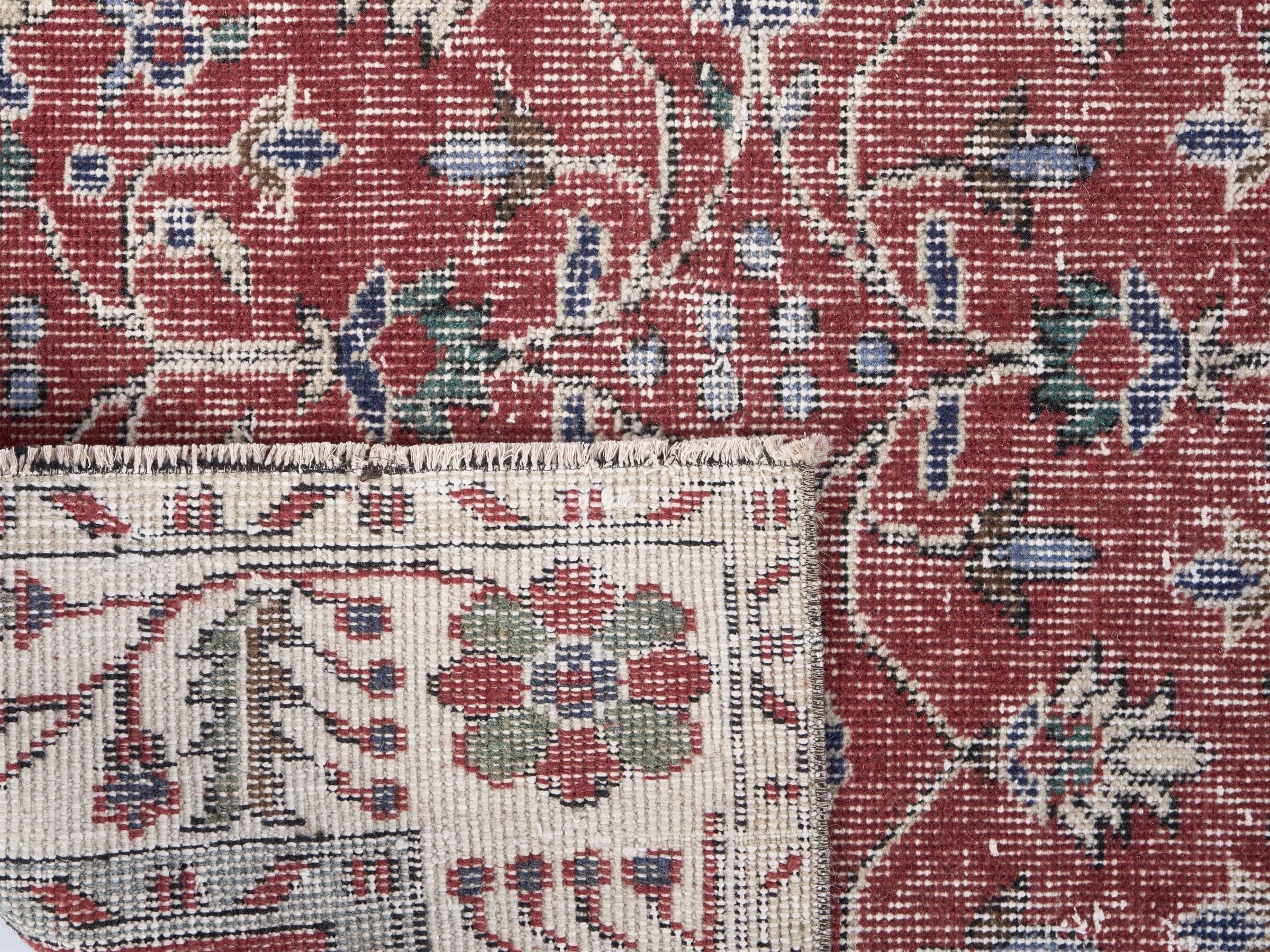 Turkish Isparta area rug in faded red and cream, view 10 of 10