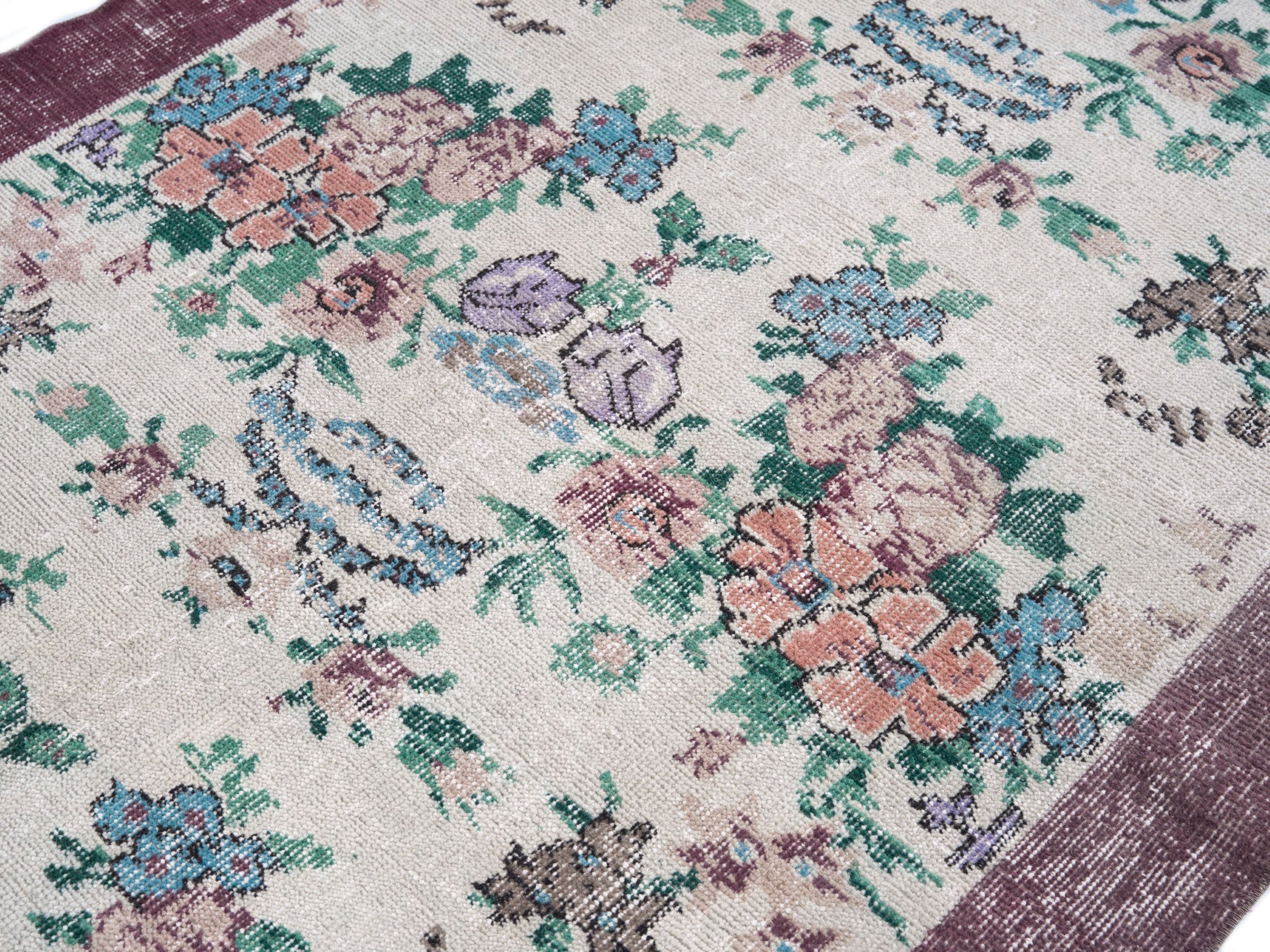 Turkish Isparta accent rug in cream and muted pink, view 5 of 10