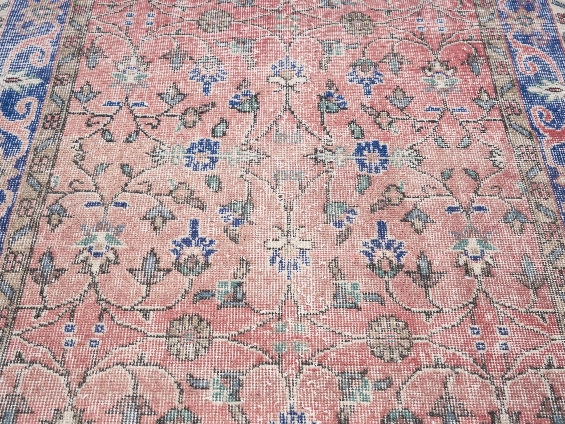 Turkish Isparta area rug in dusty rose and deep indigo, view 4 of 10