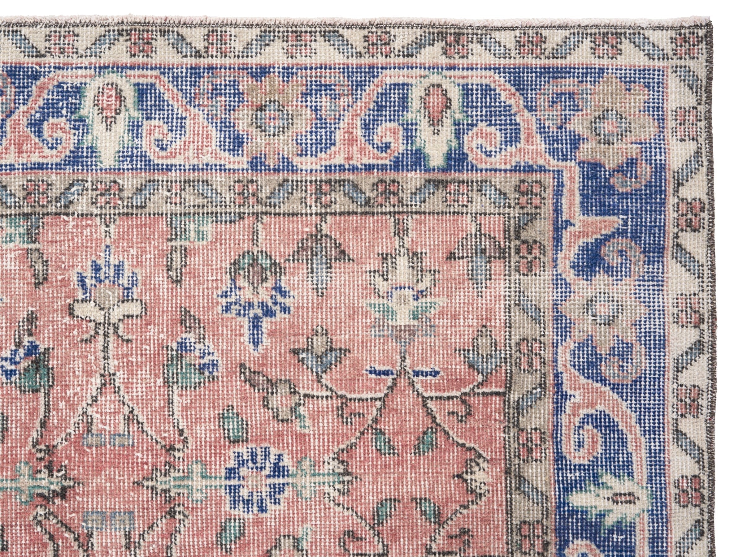 Turkish Isparta area rug in dusty rose and deep indigo, view 8 of 10