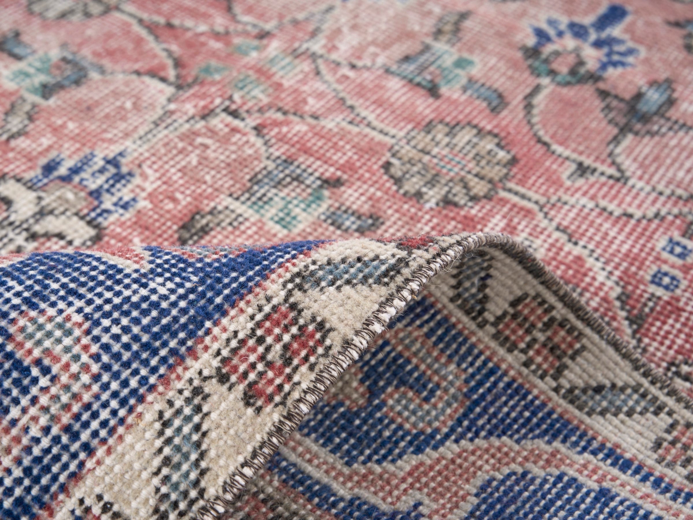 Turkish Isparta area rug in dusty rose and deep indigo, view 9 of 10