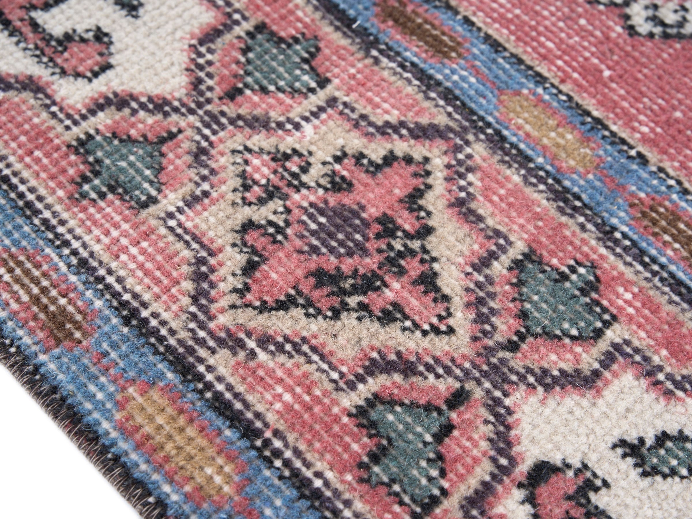 Turkish Isparta area rug in rose and navy, view 6 of 10