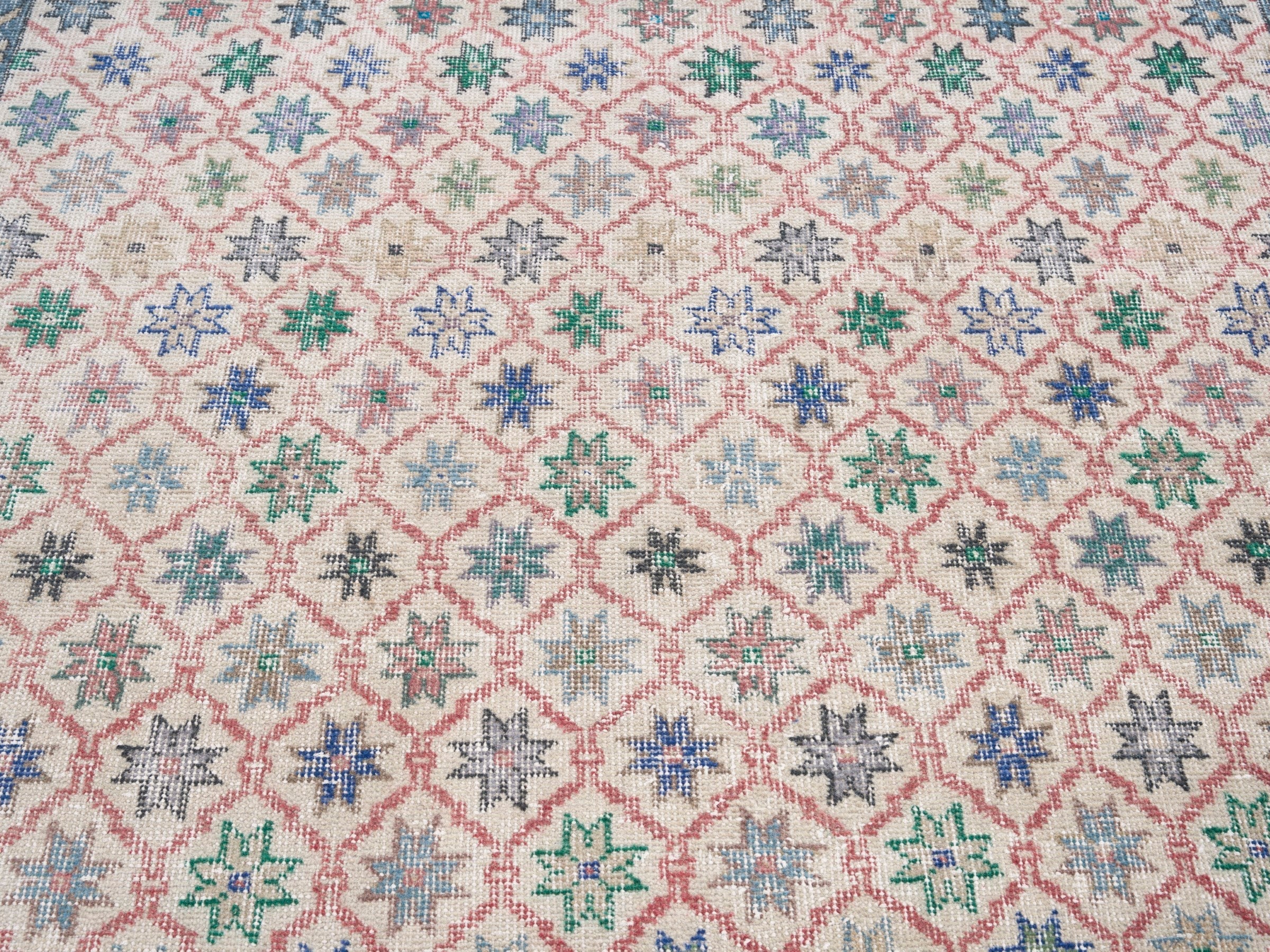 Turkish Isparta area rug in muted pink and dusty blue, view 4 of 10