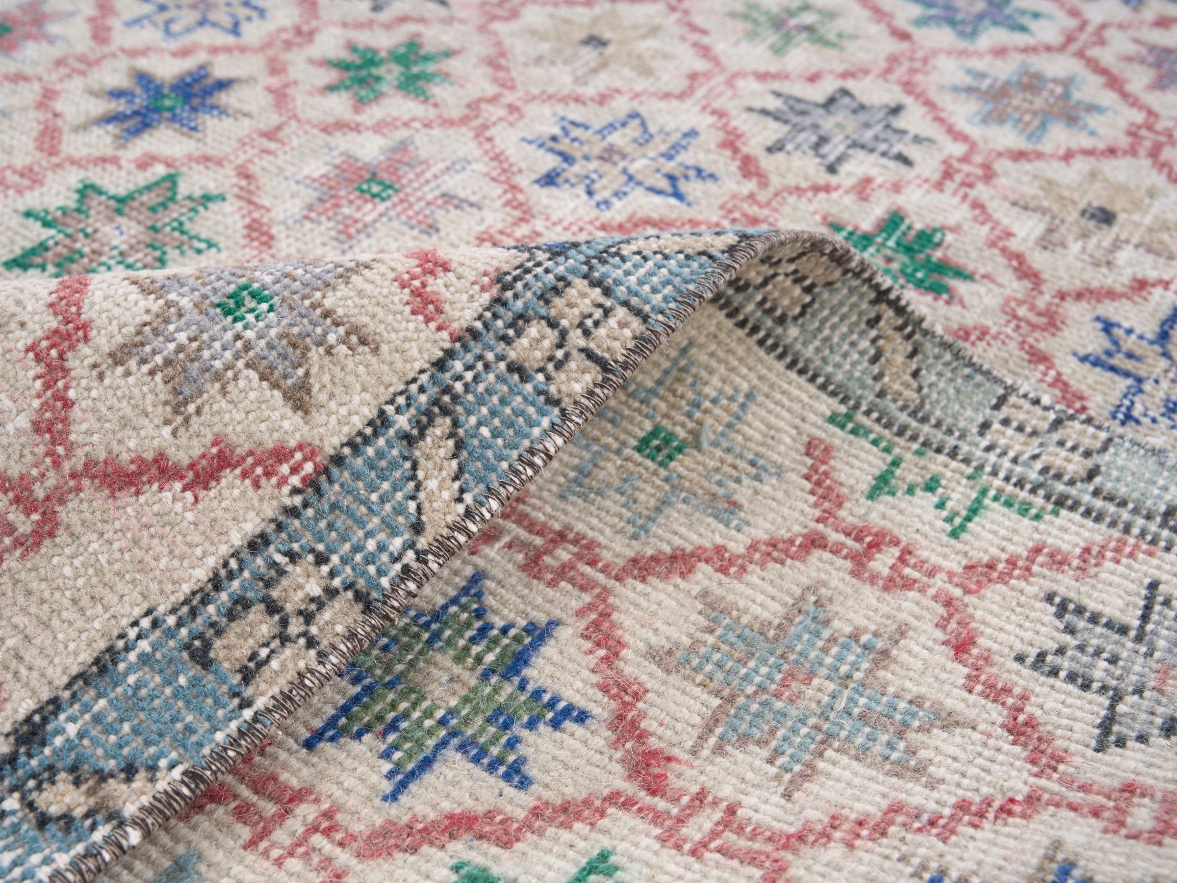 Turkish Isparta area rug in muted pink and dusty blue, view 9 of 10